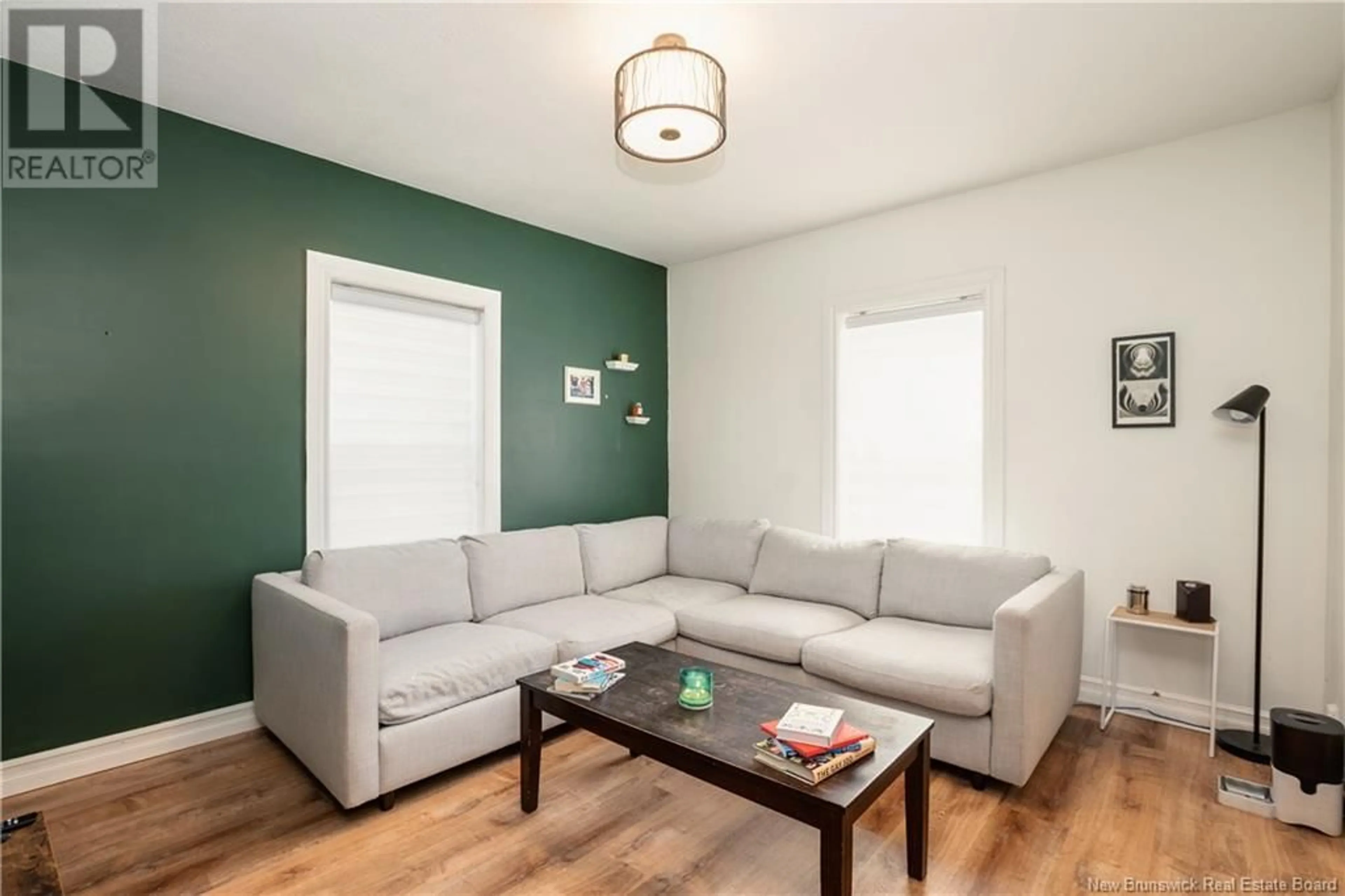 Living room with furniture, wood/laminate floor for 263 JOHN STREET, Moncton New Brunswick E1C2J5