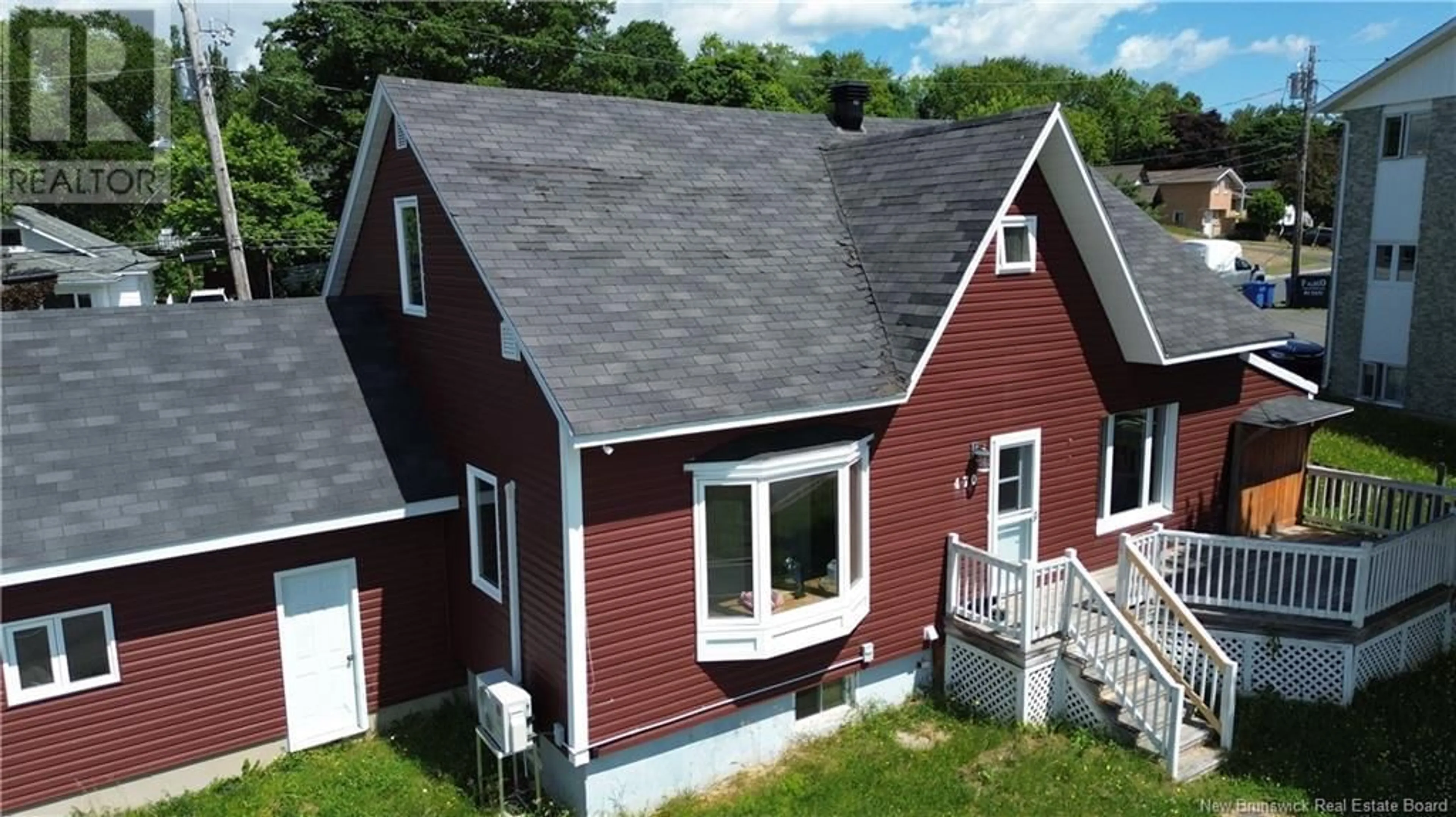 A pic from outside/outdoor area/front of a property/back of a property/a pic from drone, building for 470 RIVERSIDE DRIVE, Bathurst New Brunswick E2A4M4