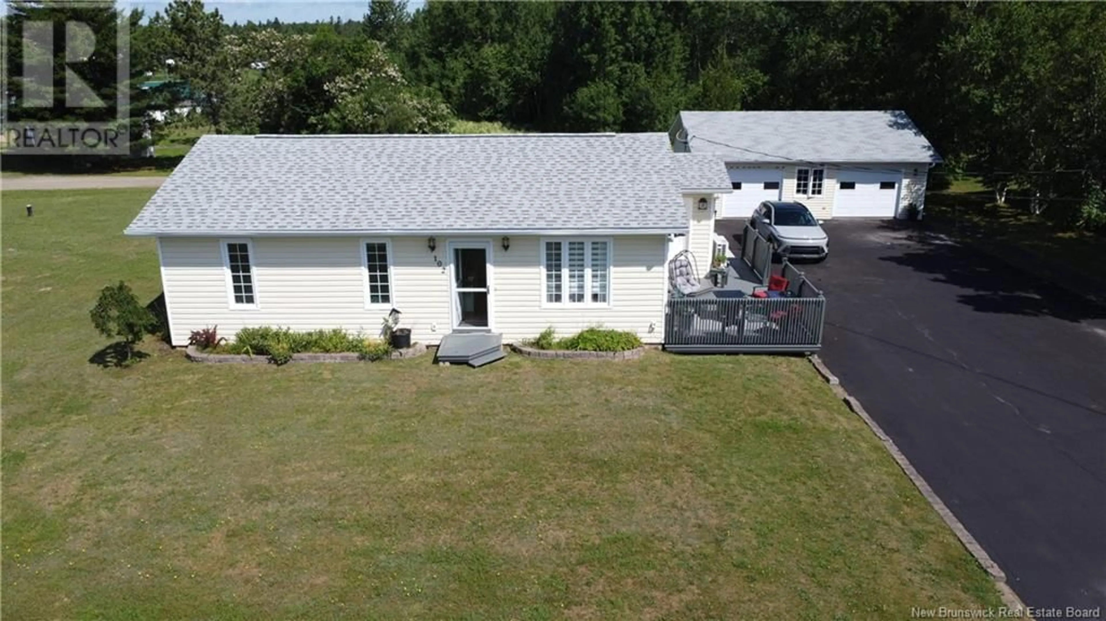 A pic from outside/outdoor area/front of a property/back of a property/a pic from drone, building for 102 KENT LODGE, Beresford New Brunswick E8K1B1