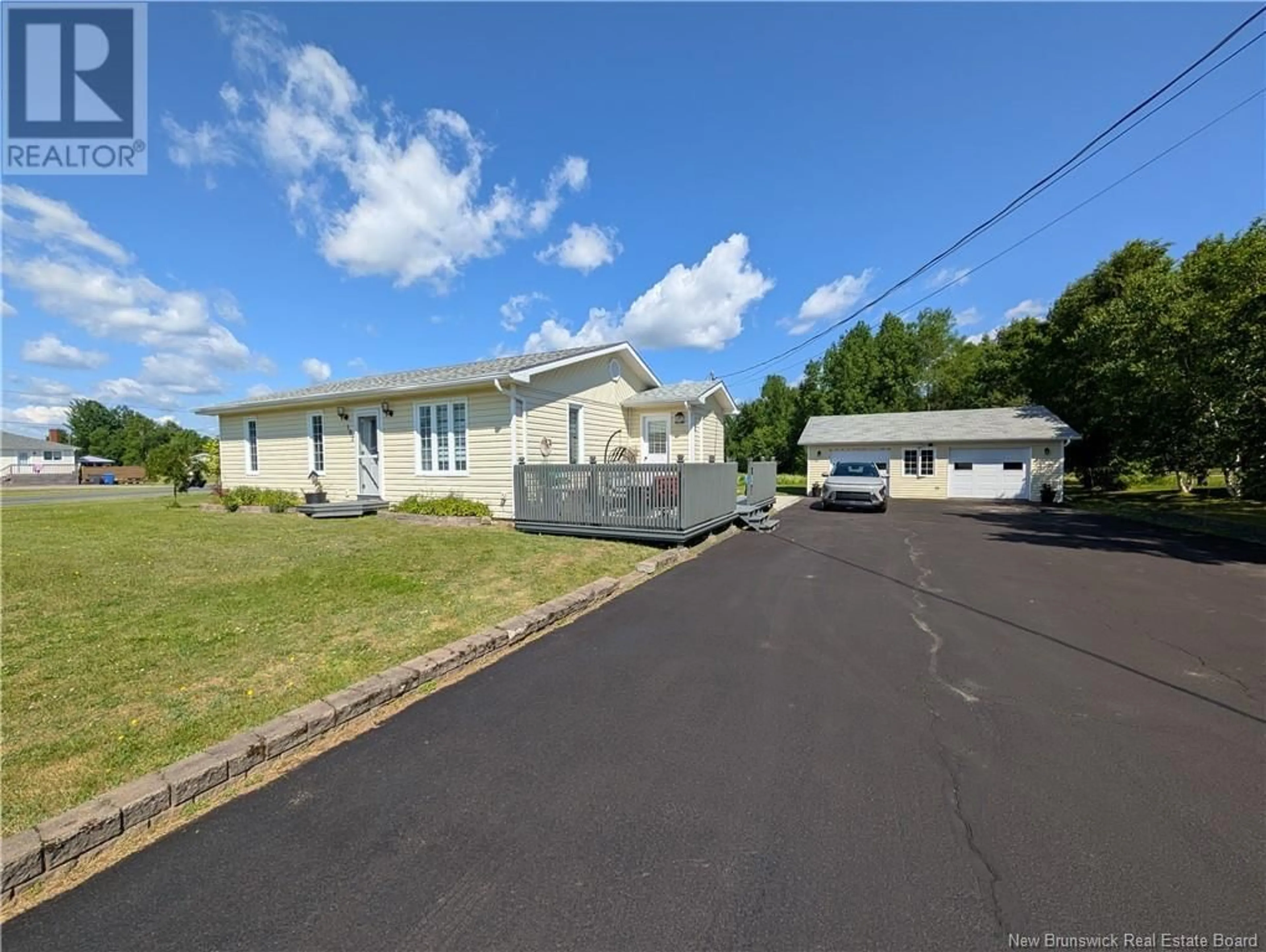 A pic from outside/outdoor area/front of a property/back of a property/a pic from drone, unknown for 102 KENT LODGE, Beresford New Brunswick E8K1B1