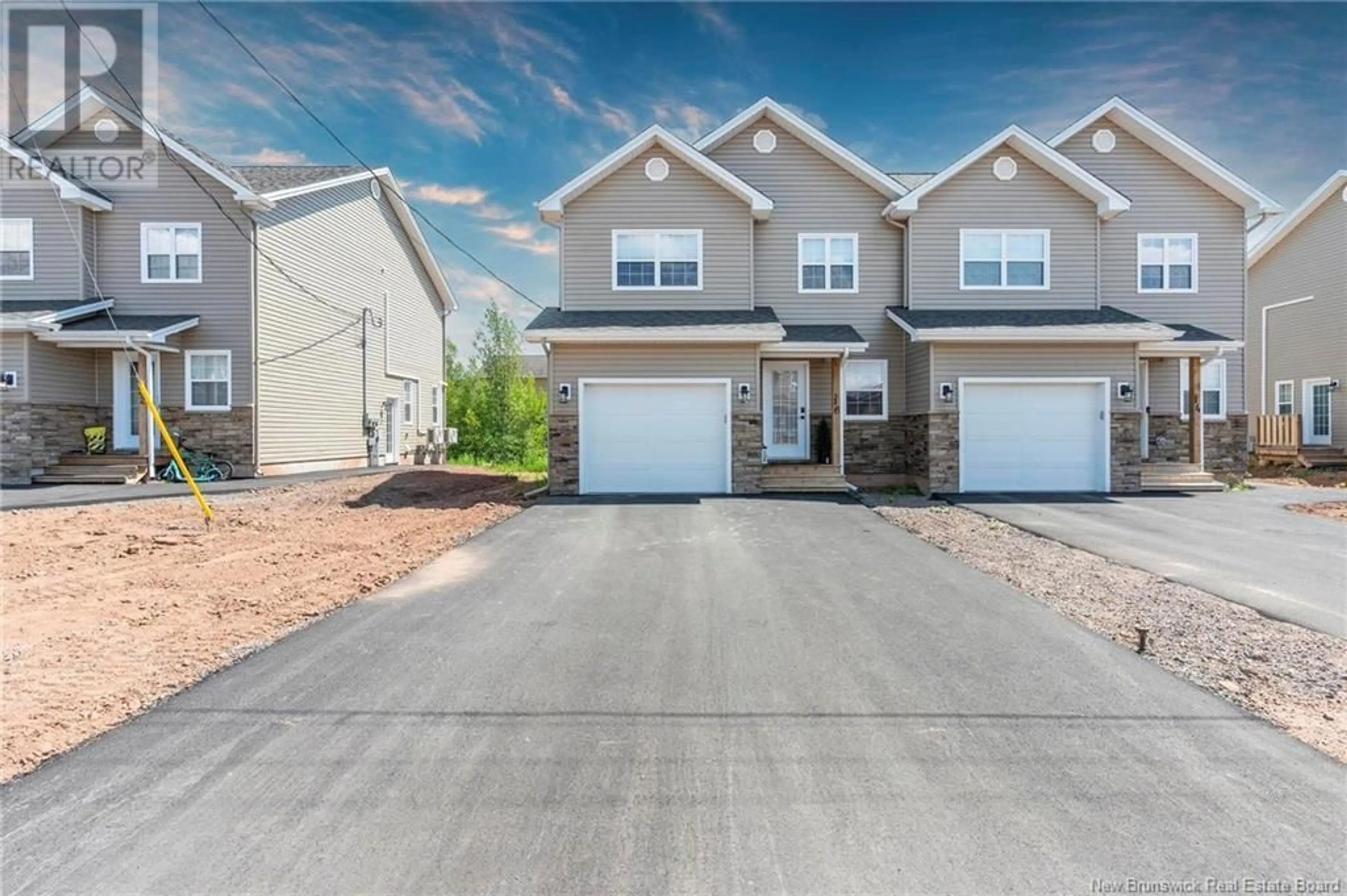 Home with vinyl exterior material, street for 16 ROCHEFORT STREET, Dieppe New Brunswick E1A6S4