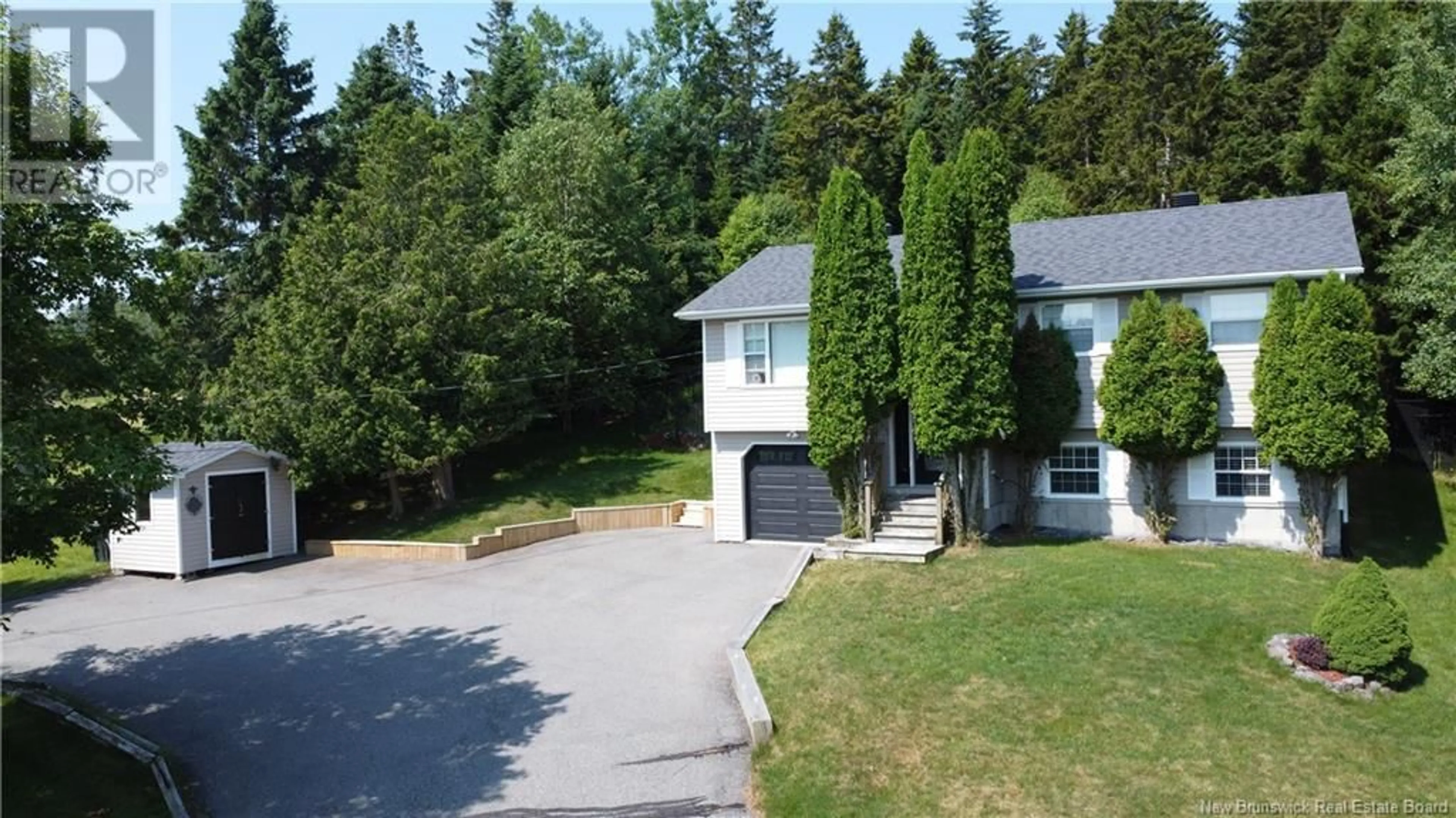 A pic from outside/outdoor area/front of a property/back of a property/a pic from drone, street for 40 GOLDRUSH DRIVE, Quispamsis New Brunswick E2E5Z7
