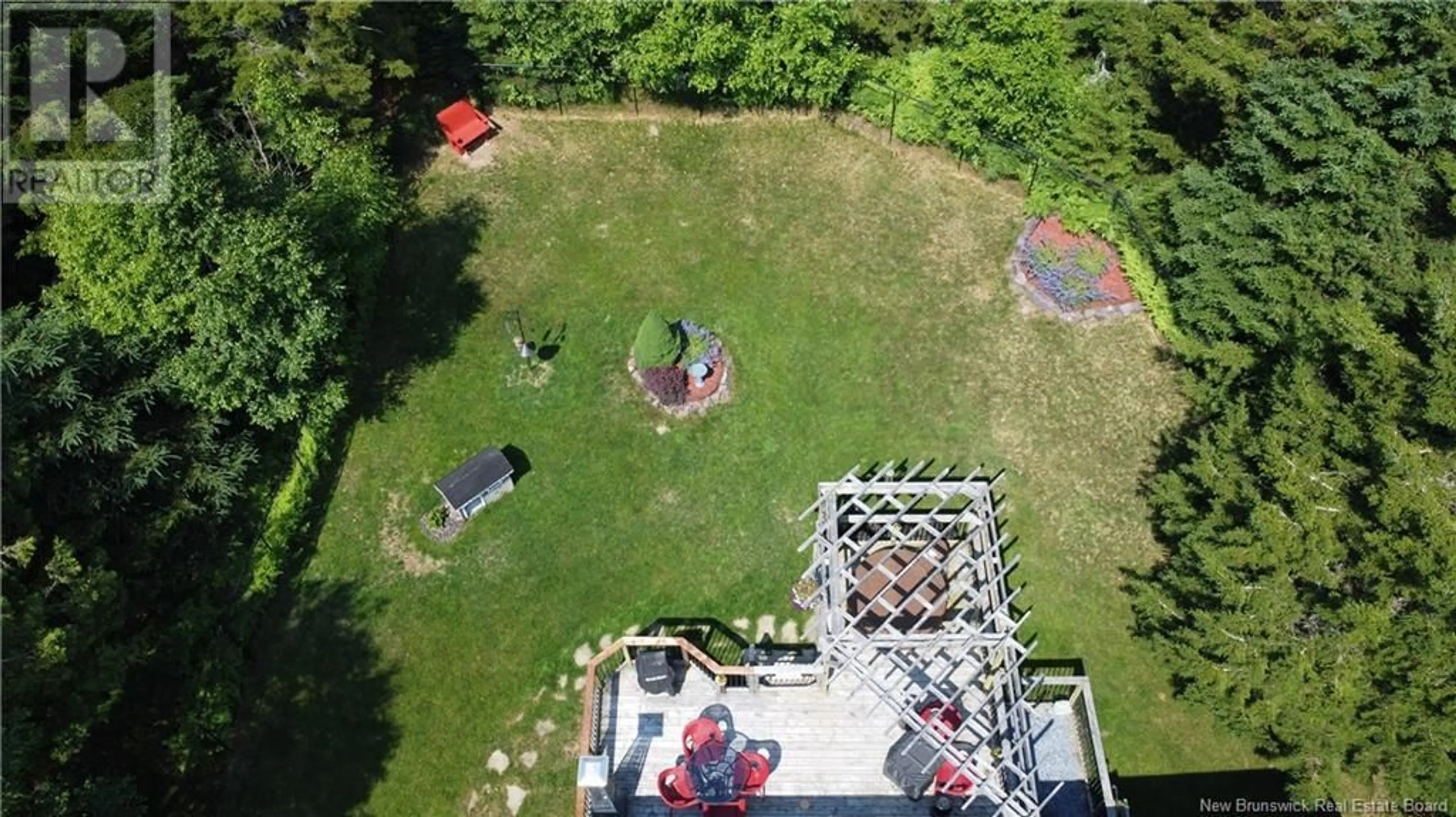 A pic from outside/outdoor area/front of a property/back of a property/a pic from drone, unknown for 40 GOLDRUSH DRIVE, Quispamsis New Brunswick E2E5Z7