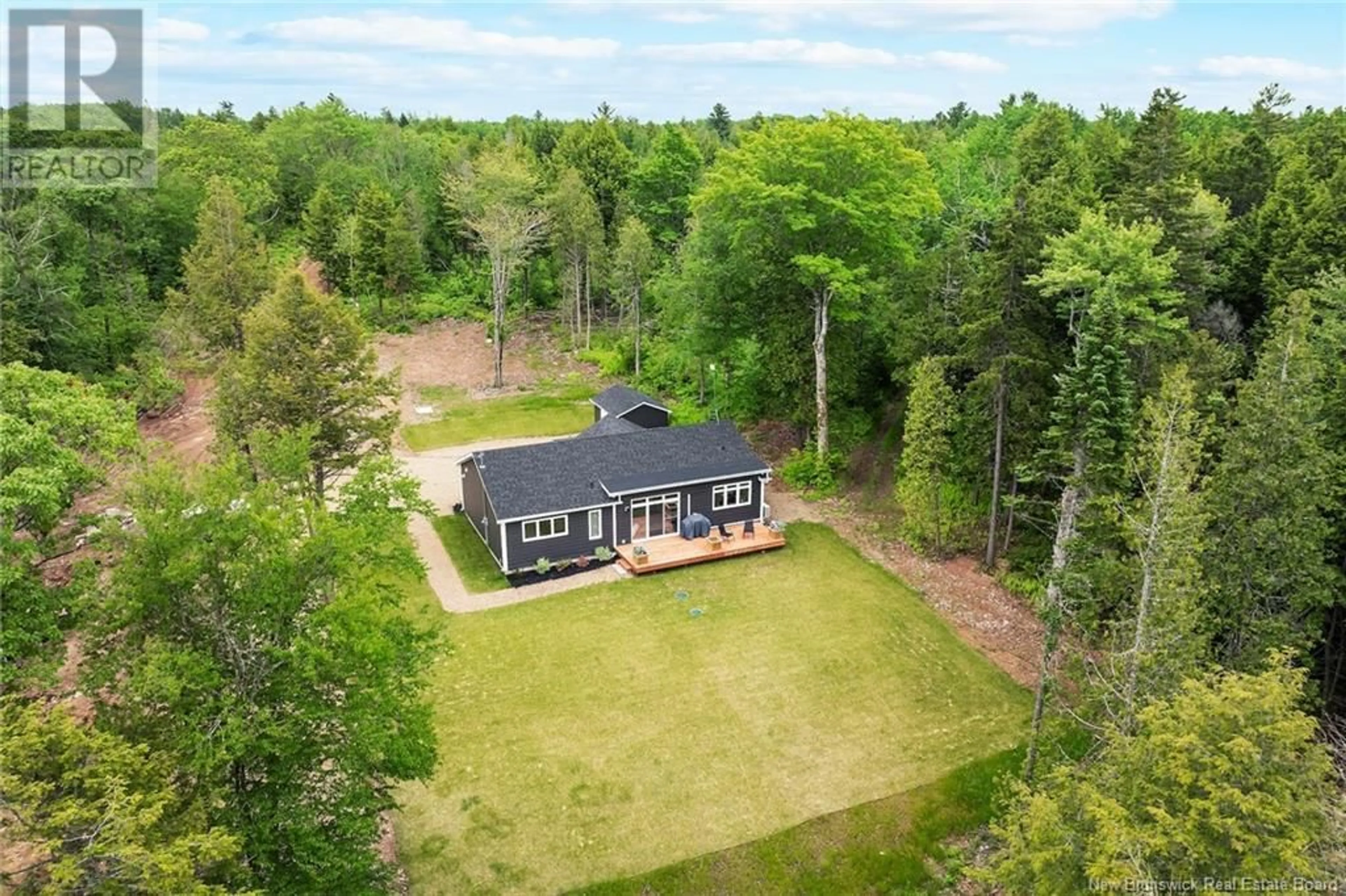 A pic from outside/outdoor area/front of a property/back of a property/a pic from drone, forest/trees view for 456 COX POINT ROAD, Cumberland Bay New Brunswick E4A3N9