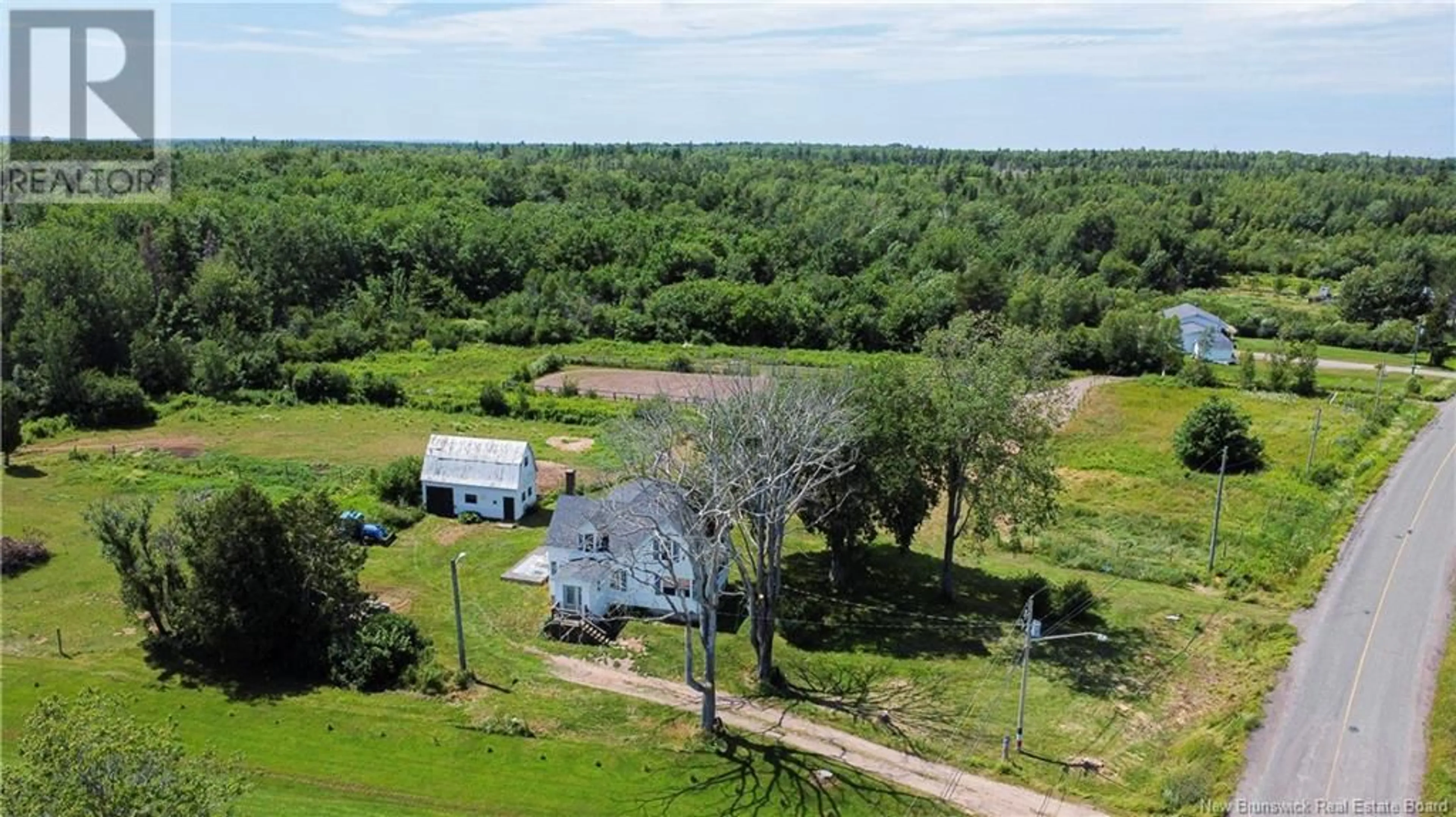 A pic from outside/outdoor area/front of a property/back of a property/a pic from drone, water/lake/river/ocean view for 535 CH LEBLANC, Saint-Andre-LeBlanc New Brunswick E4P6B2