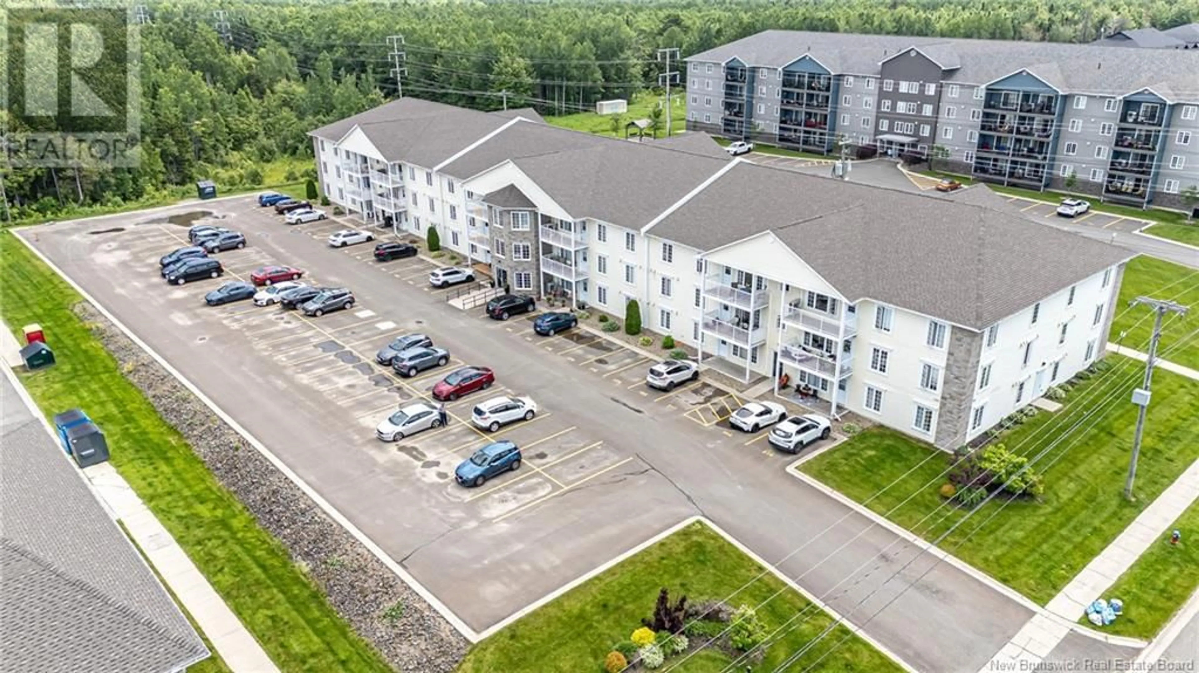 A pic from outside/outdoor area/front of a property/back of a property/a pic from drone, building for 220 - 130 LIAN STREET, Fredericton New Brunswick E3C0G4