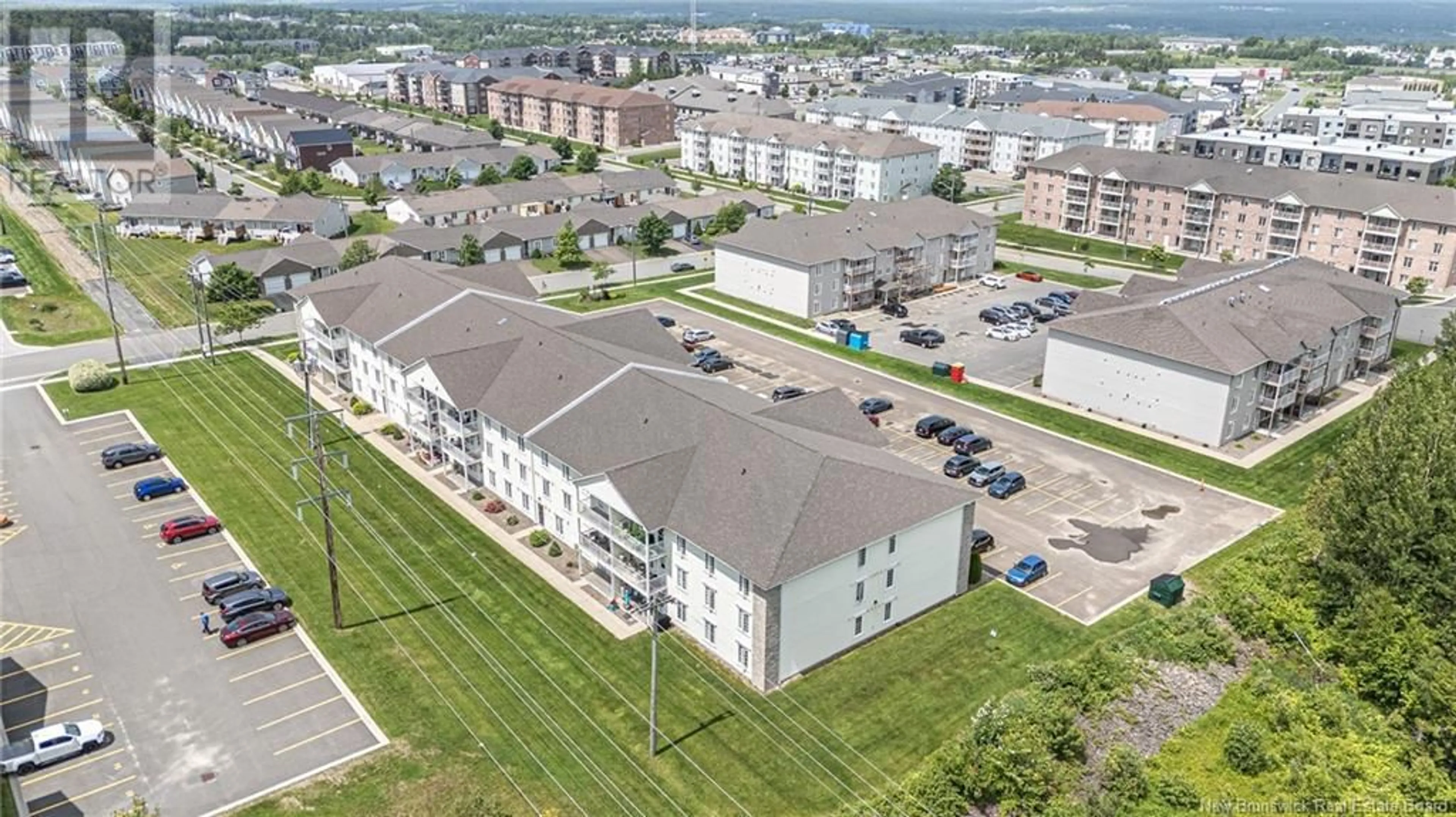 A pic from outside/outdoor area/front of a property/back of a property/a pic from drone, city buildings view from balcony for 220 - 130 LIAN STREET, Fredericton New Brunswick E3C0G4