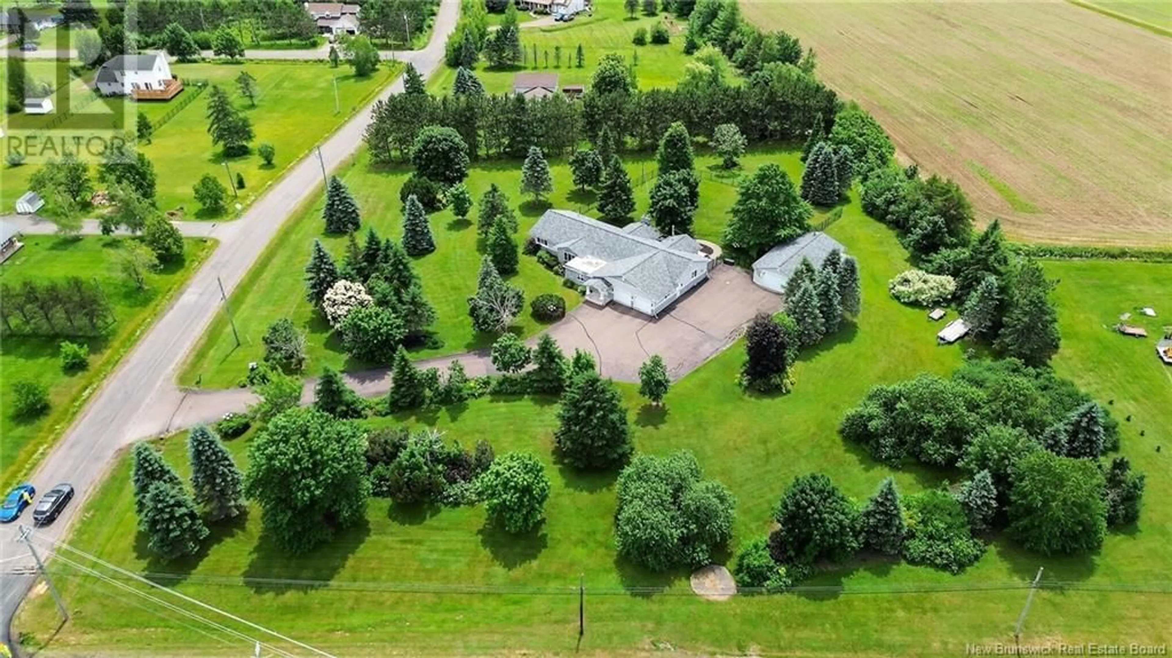 A pic from outside/outdoor area/front of a property/back of a property/a pic from drone, unknown for 9 STIRLING CRESCENT, Allison New Brunswick E1G4G5
