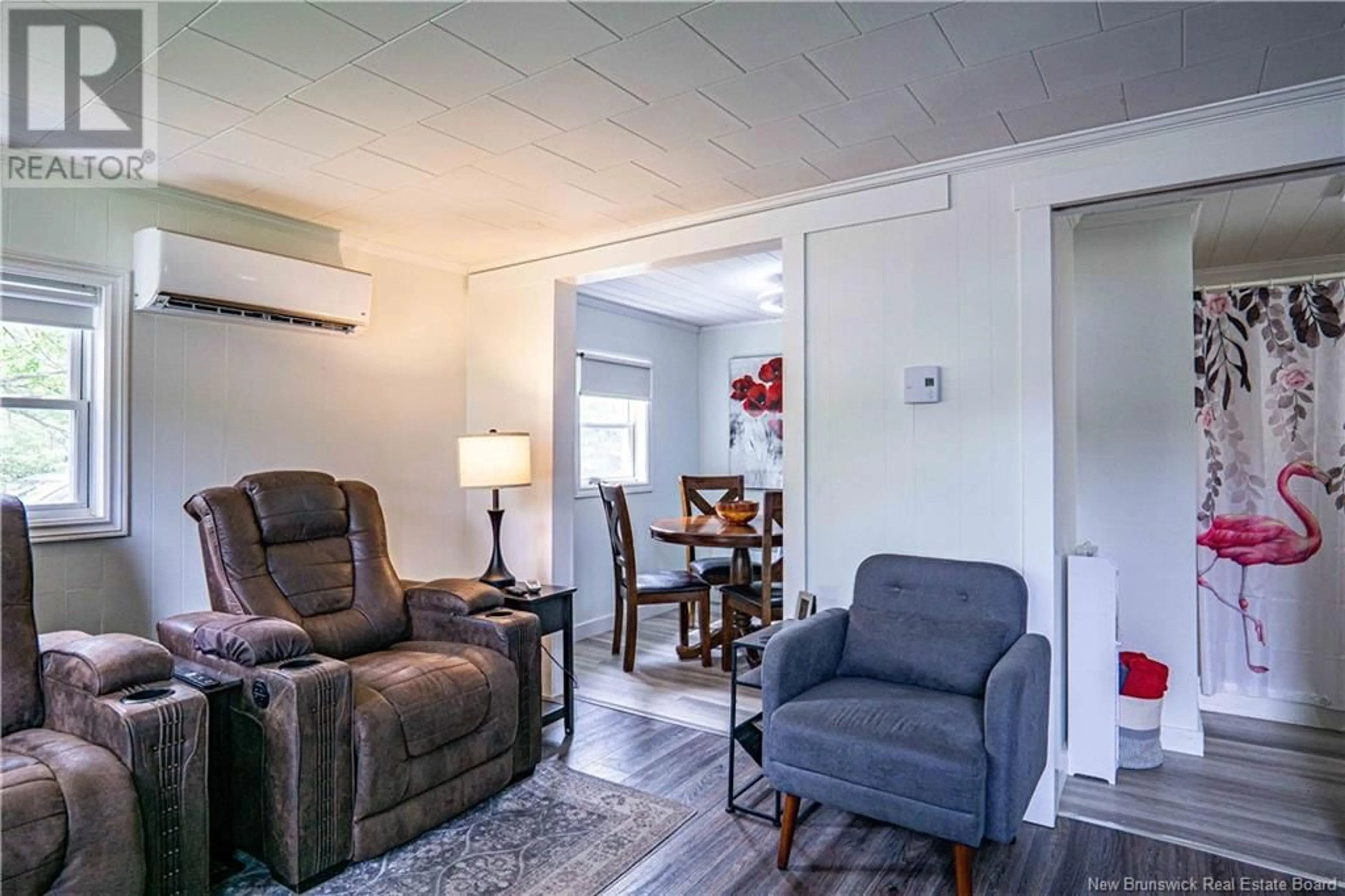 Living room with furniture, unknown for 24 FOREST AVENUE, Chipman New Brunswick E3A1Z9
