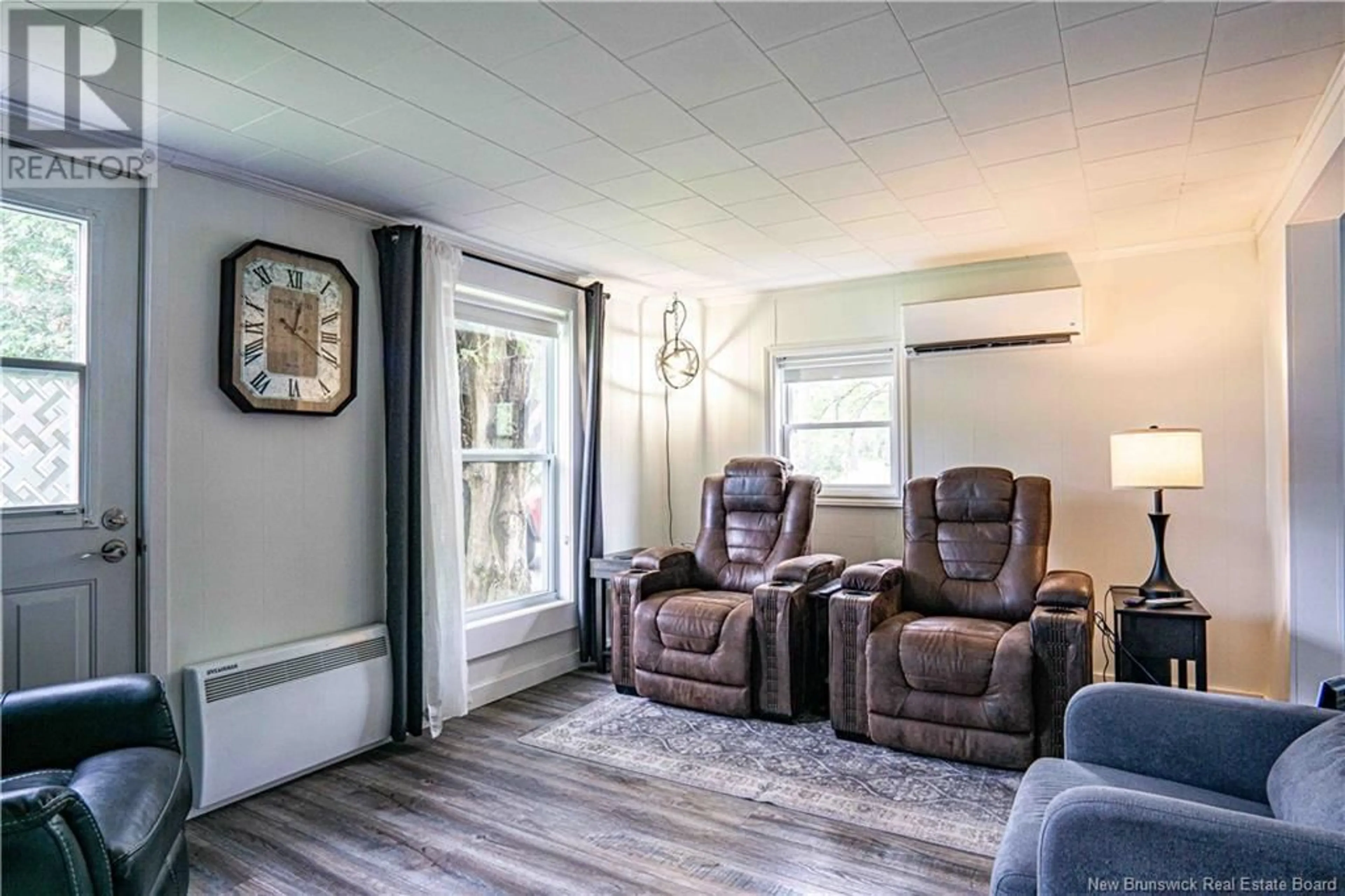 Living room with furniture, unknown for 24 FOREST AVENUE, Chipman New Brunswick E3A1Z9