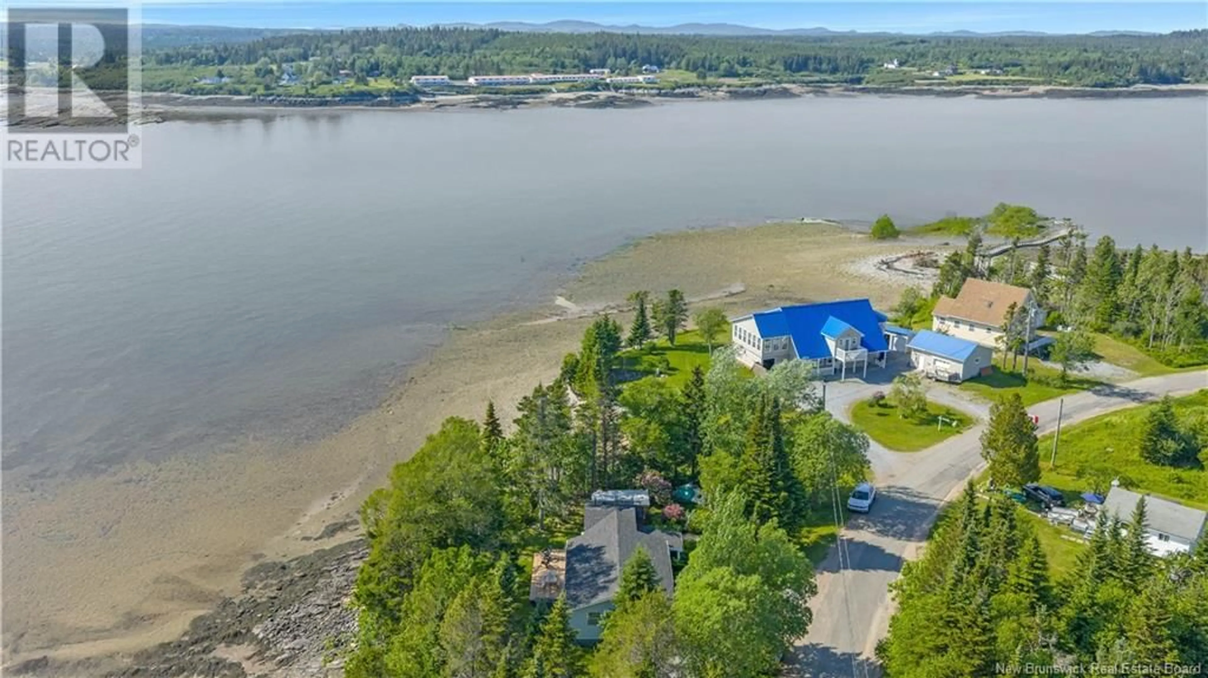 A pic from outside/outdoor area/front of a property/back of a property/a pic from drone, water/lake/river/ocean view for 229 MCCARTHY'S POINT ROAD, Pocologan New Brunswick E5J1A7