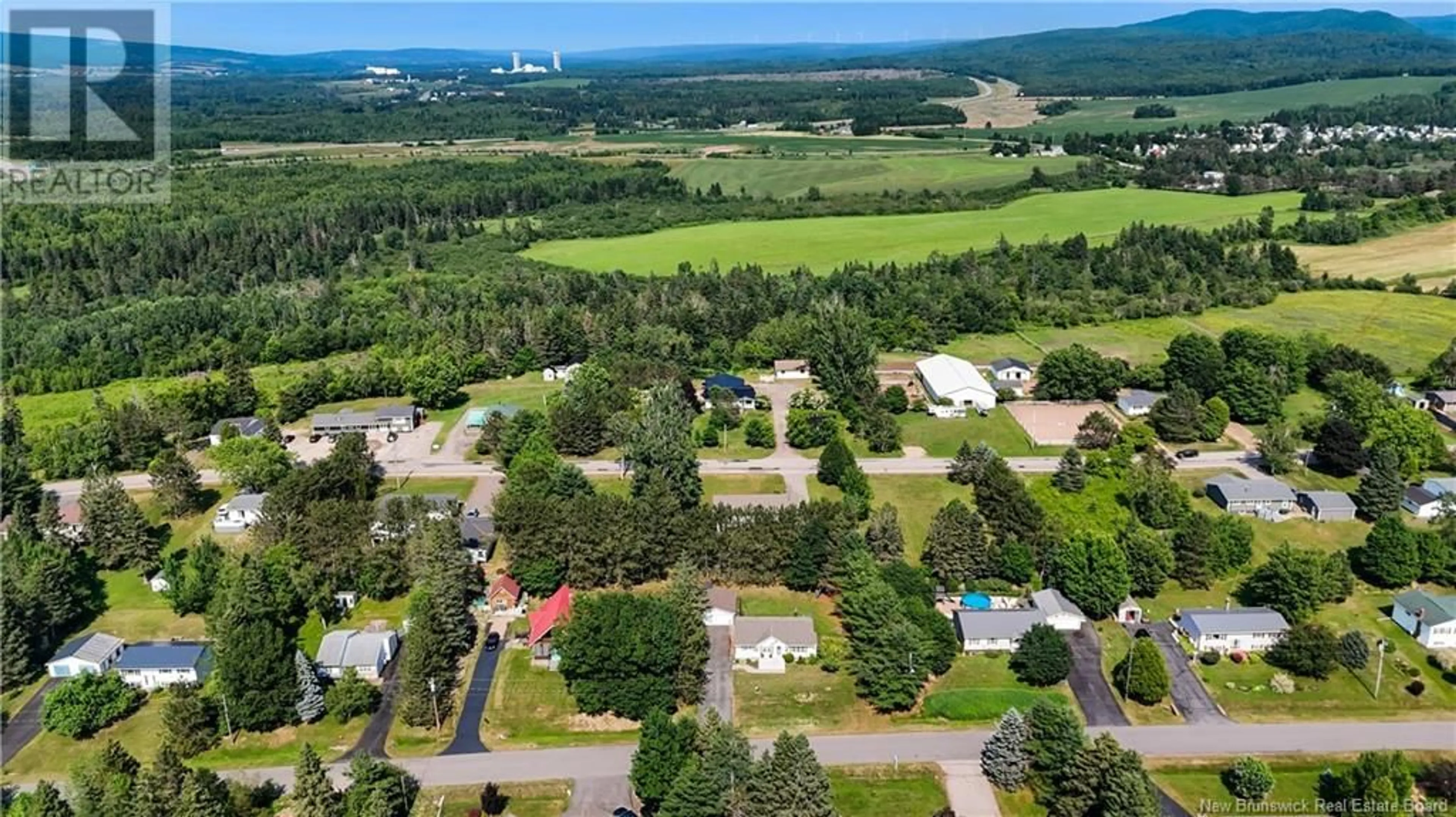 A pic from outside/outdoor area/front of a property/back of a property/a pic from drone, water/lake/river/ocean view for 13 BARBARA DRIVE, Sussex Corner New Brunswick E4E2S9