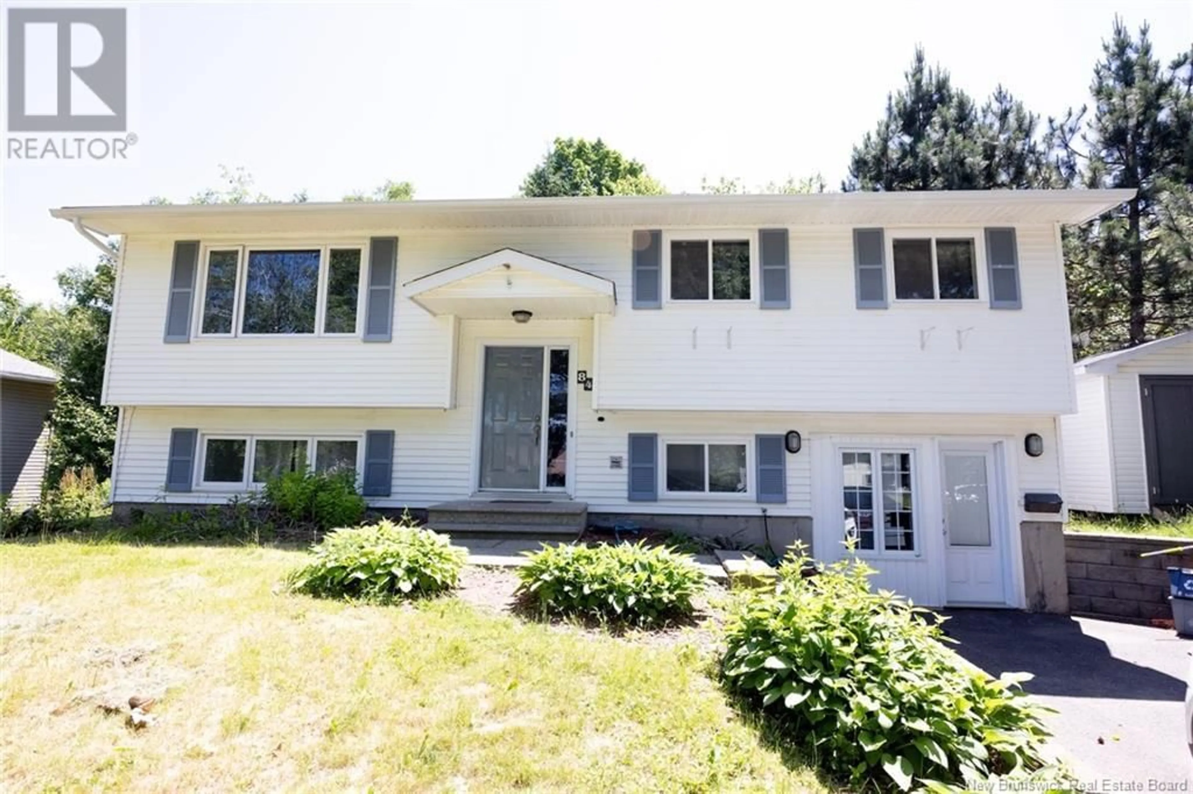 Home with vinyl exterior material, street for 84 PUGSLEY STREET, Fredericton New Brunswick E3B6J4