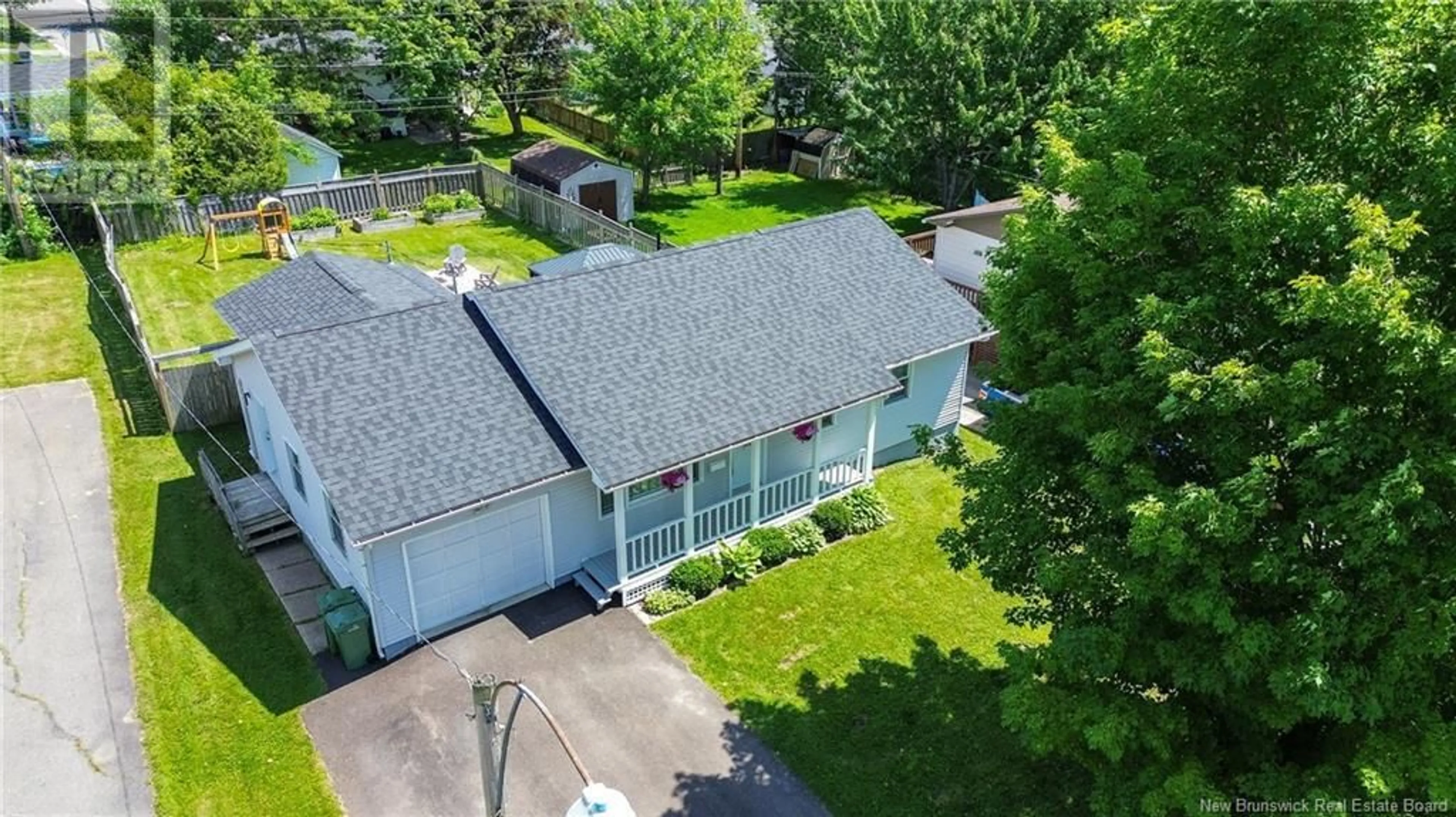 A pic from outside/outdoor area/front of a property/back of a property/a pic from drone, street for 114 MOSS AVENUE, Fredericton New Brunswick E3A2G1