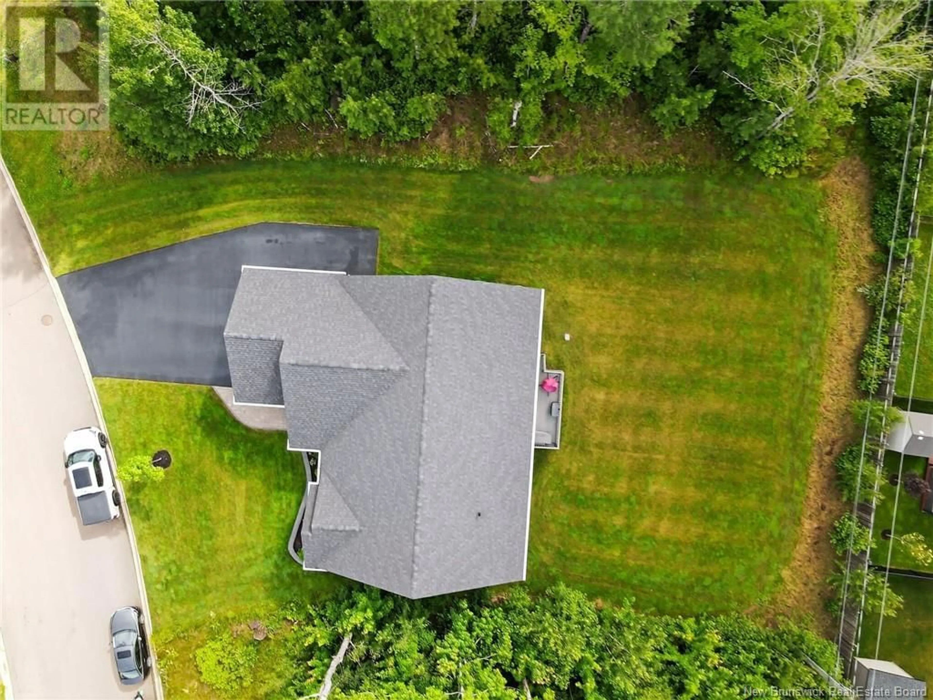 A pic from outside/outdoor area/front of a property/back of a property/a pic from drone, unknown for 60 BLACKSTONE DRIVE, Moncton New Brunswick E1G0X8