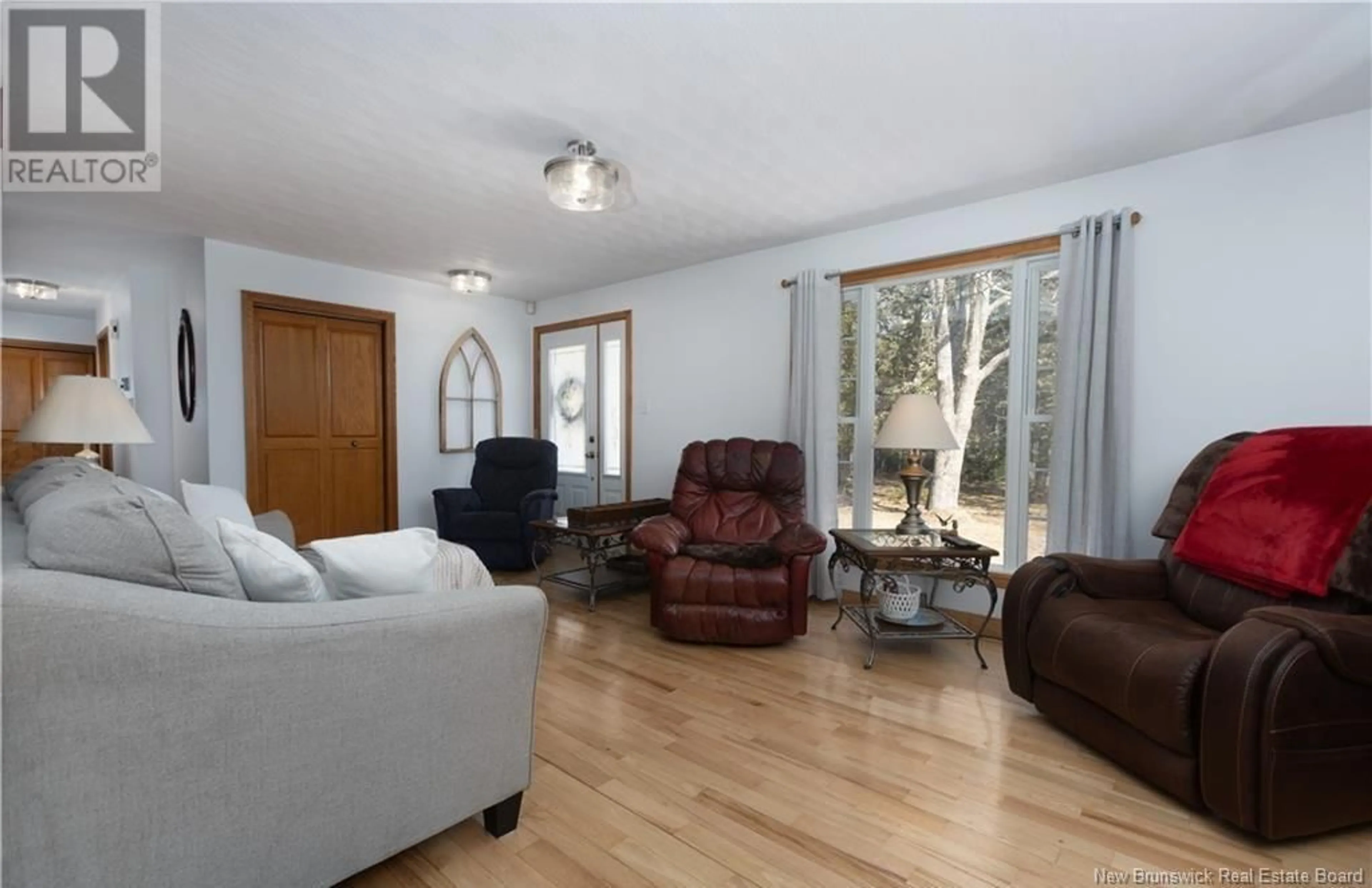 Living room with furniture, wood/laminate floor for 4223 ROUTE 910, Shenstone New Brunswick E4H4G8