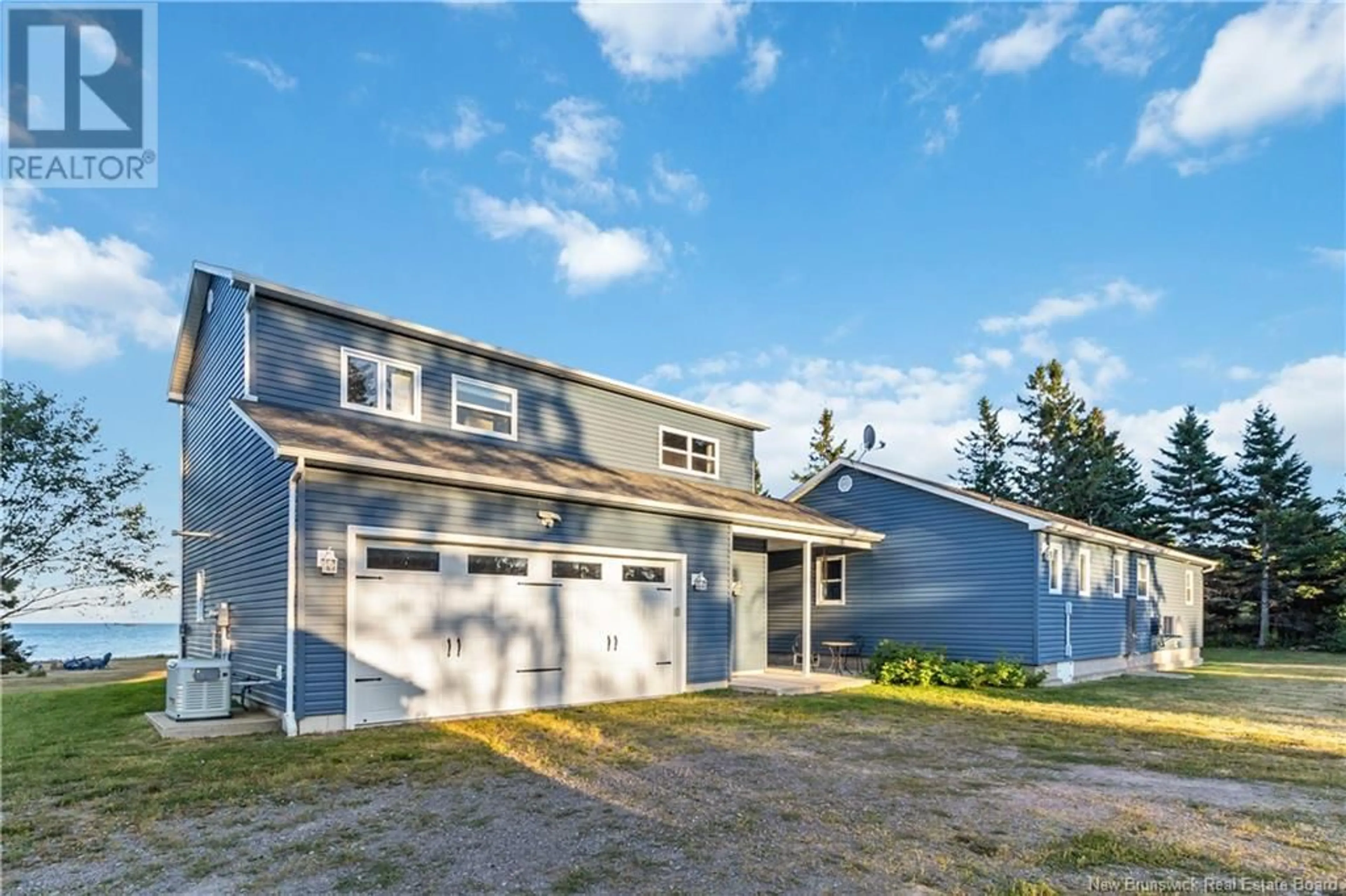 Home with vinyl exterior material, street for 2430 530 ROUTE, Grande-Digue New Brunswick E4R5M7
