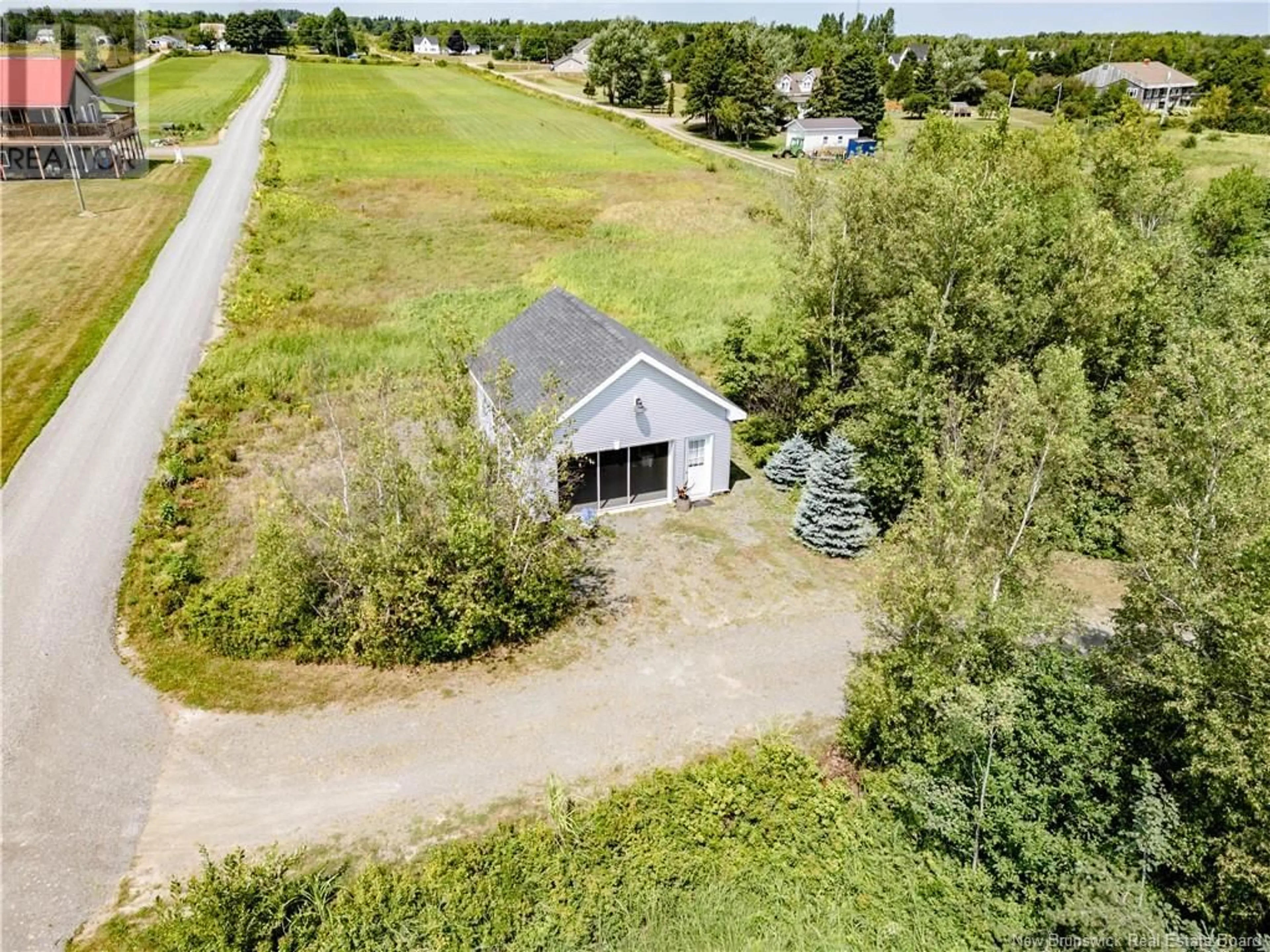 A pic from outside/outdoor area/front of a property/back of a property/a pic from drone, unknown for 79 DONAT ROAD, Grande-Digue New Brunswick E4R4G6