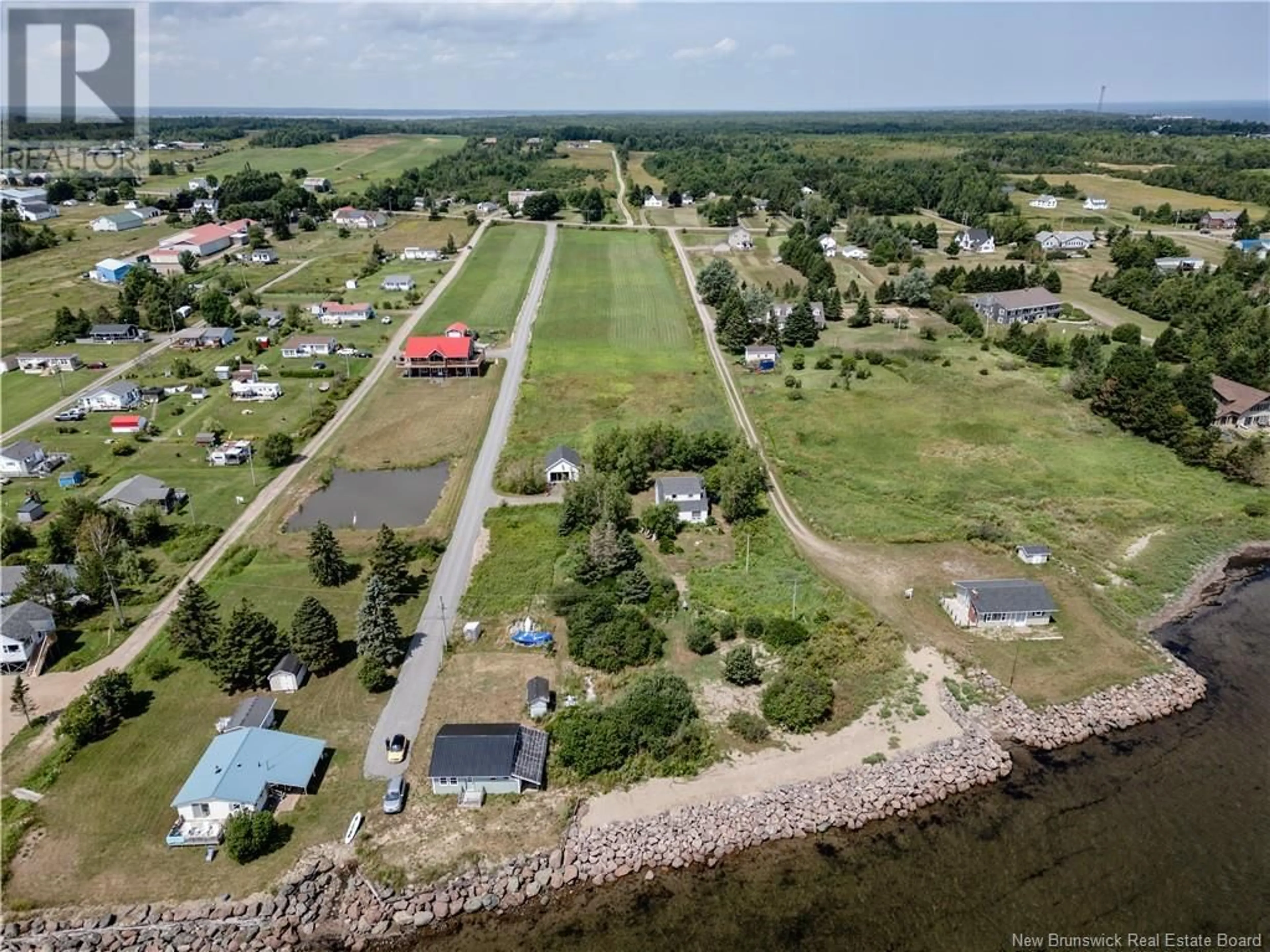 A pic from outside/outdoor area/front of a property/back of a property/a pic from drone, water/lake/river/ocean view for 79 DONAT ROAD, Grande-Digue New Brunswick E4R4G6