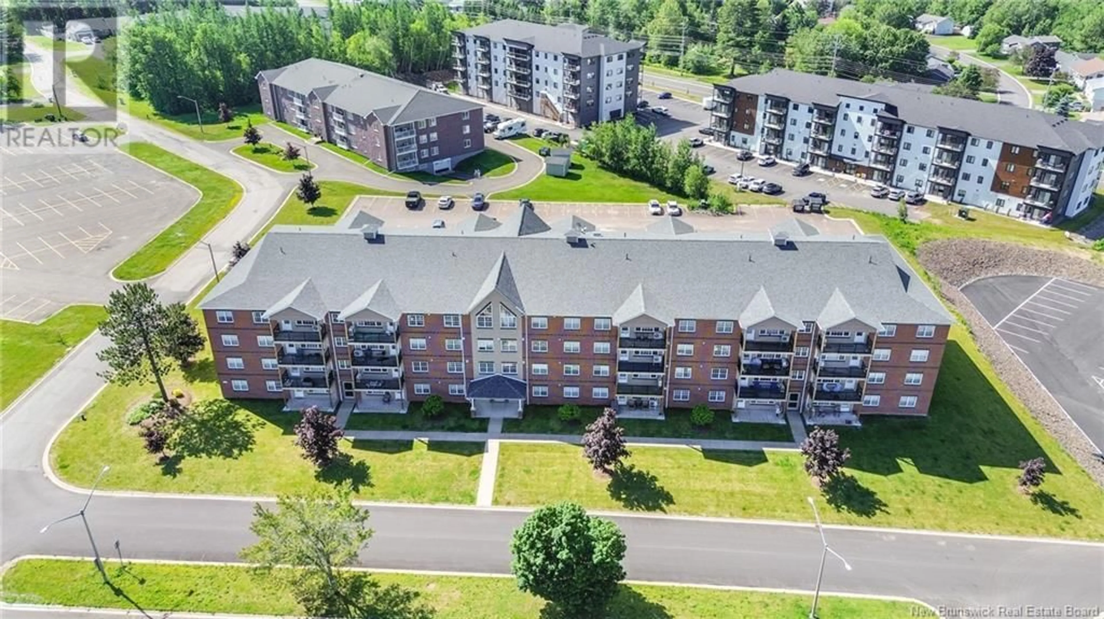 A pic from outside/outdoor area/front of a property/back of a property/a pic from drone, city buildings view from balcony for 405 - 65 BRAYSON BOULEVARD, Oromocto New Brunswick E2V0J2