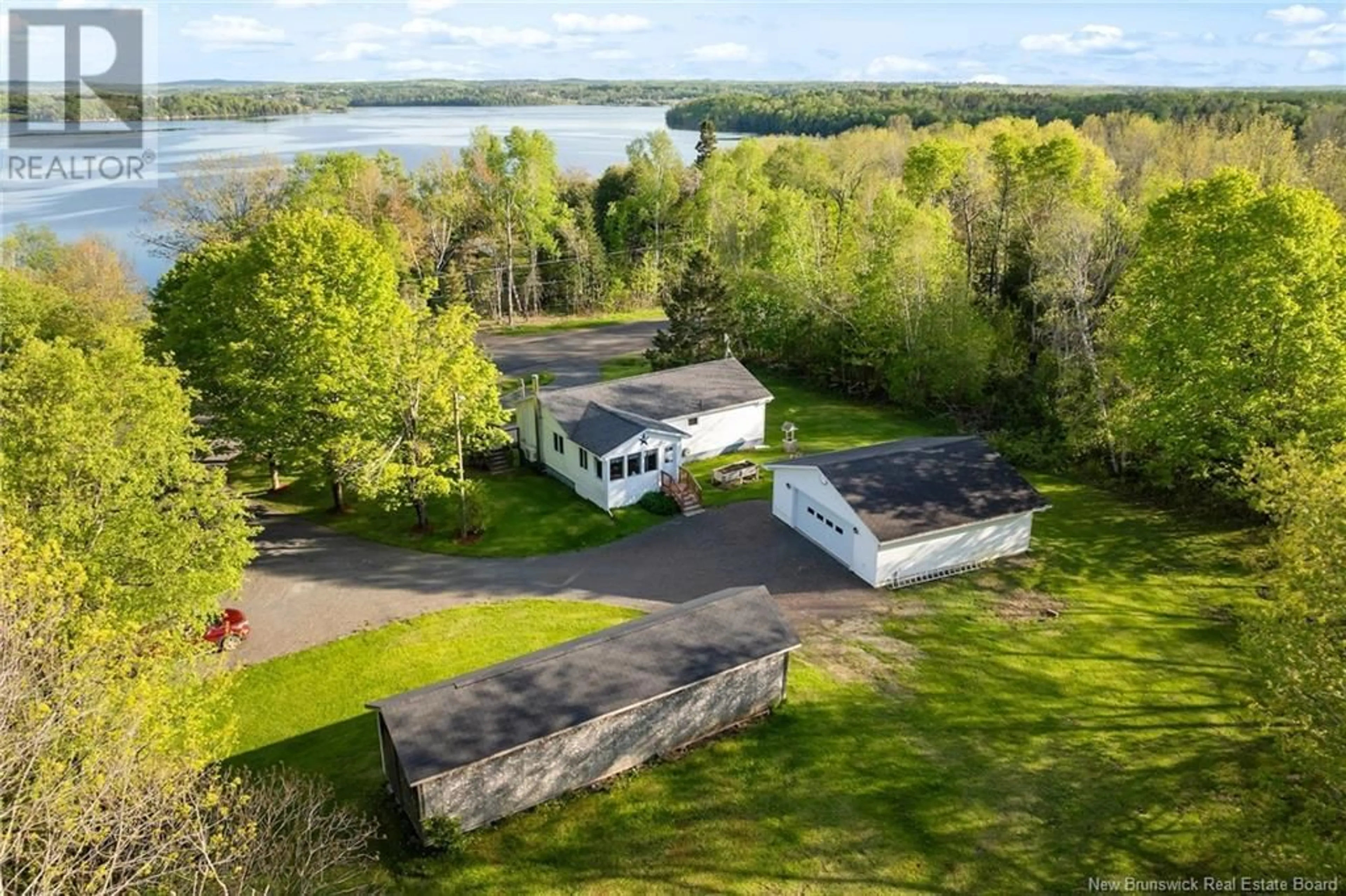 A pic from outside/outdoor area/front of a property/back of a property/a pic from drone, water/lake/river/ocean view for 2044 ROUTE 105, Lower Queensbury New Brunswick E6L2W6