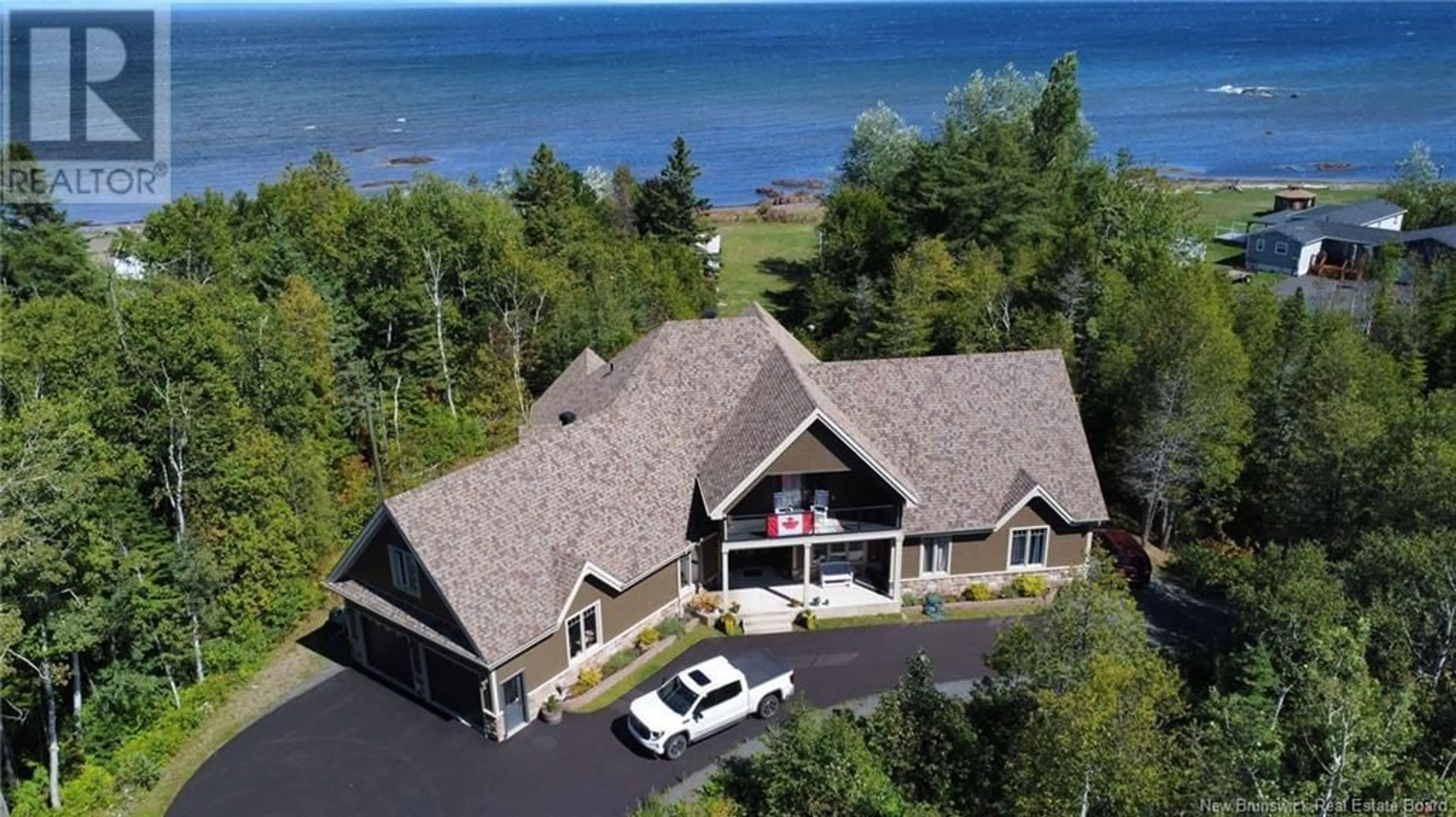 A pic from outside/outdoor area/front of a property/back of a property/a pic from drone, water/lake/river/ocean view for 495 PRINCIPALE STREET, Pointe-Verte New Brunswick E8J2R2