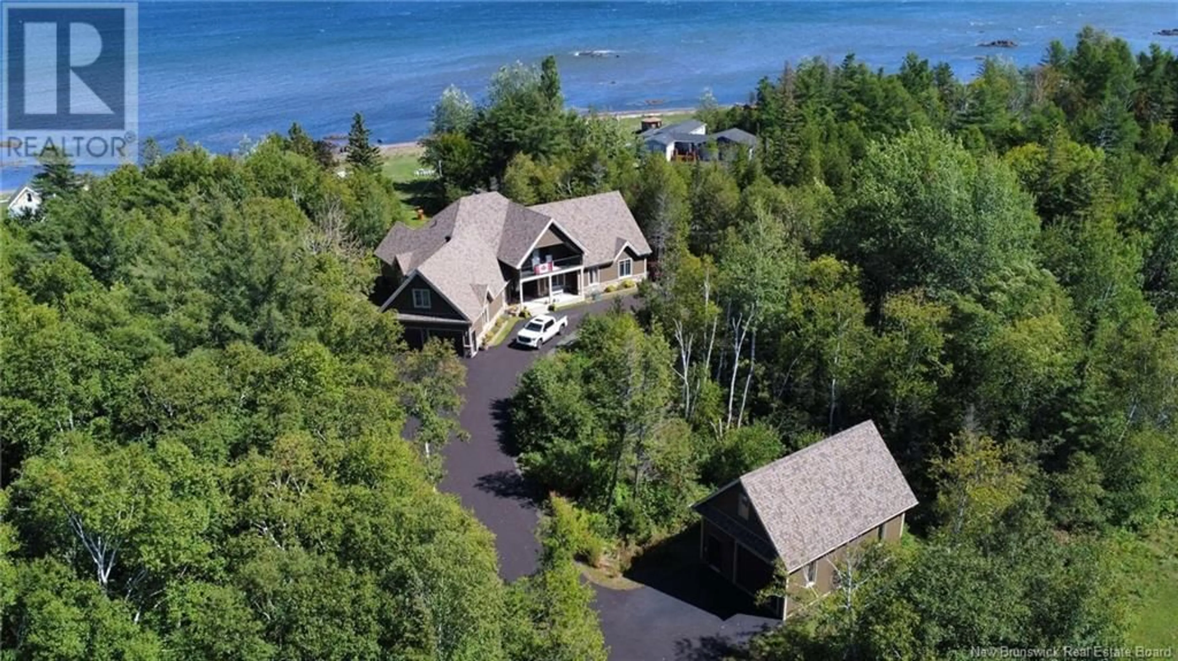 A pic from outside/outdoor area/front of a property/back of a property/a pic from drone, water/lake/river/ocean view for 495 PRINCIPALE STREET, Pointe-Verte New Brunswick E8J2R2