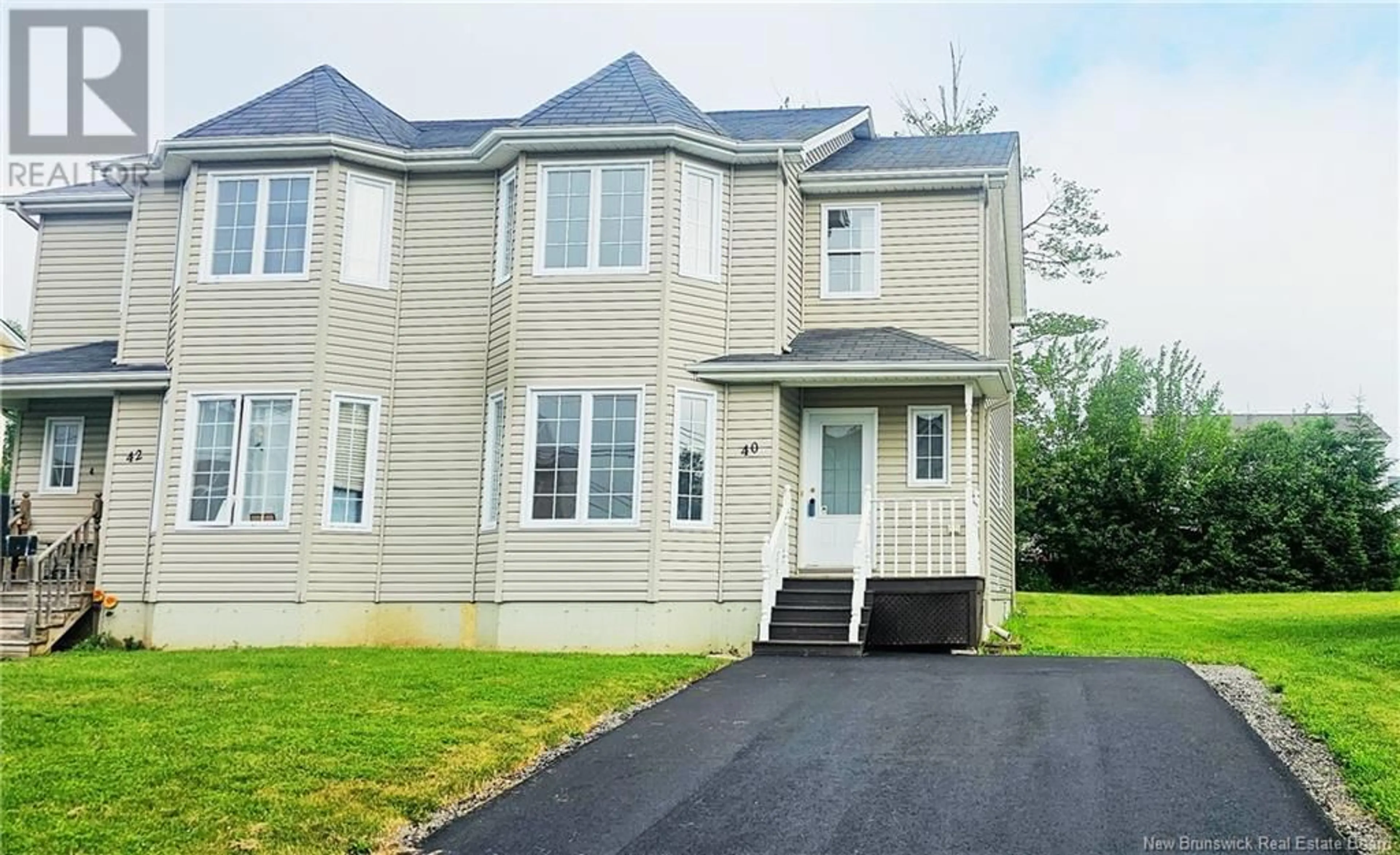 Home with vinyl exterior material, street for 40 MOSSYOAK CRESCENT, Moncton New Brunswick E1G0J7