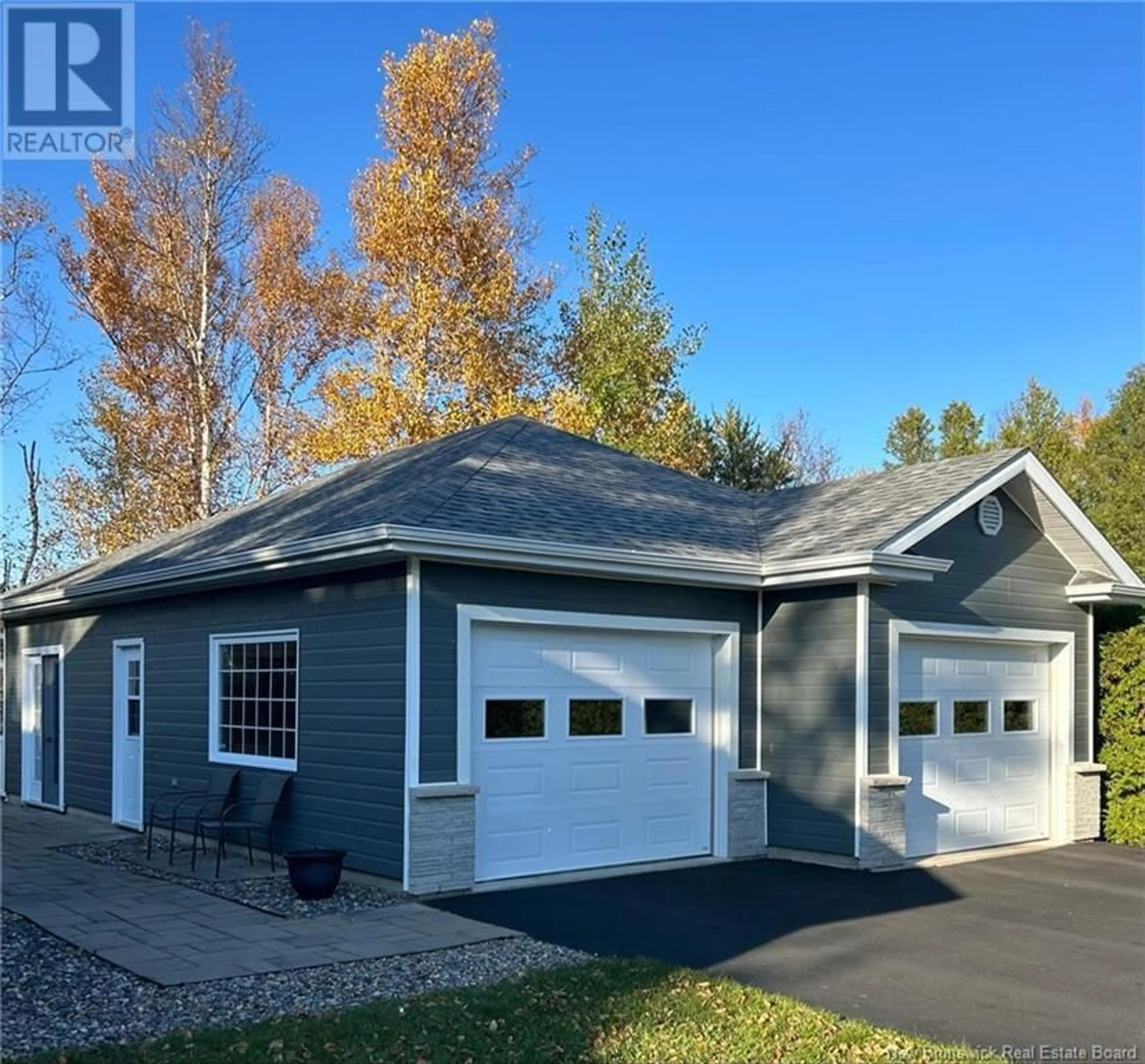 Home with vinyl exterior material, street for 100 PARC STREET, Nigadoo New Brunswick E8K3T6
