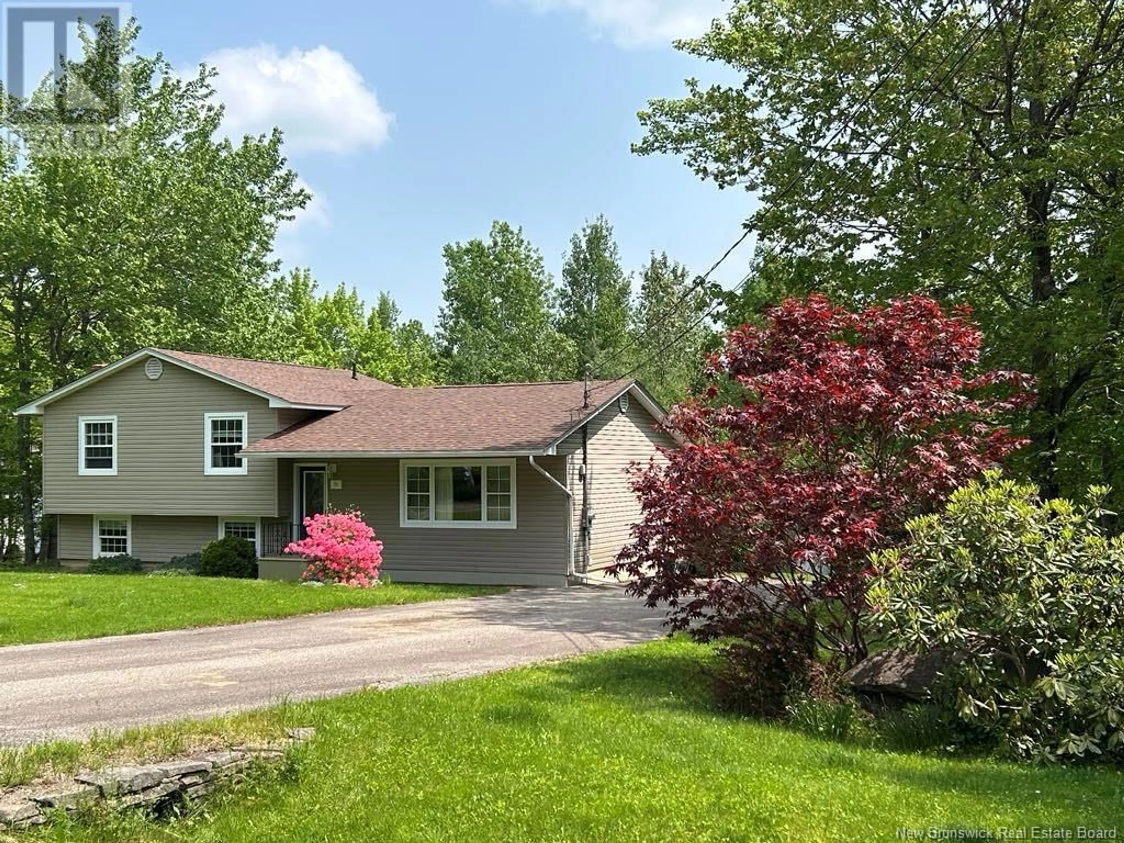 Home with vinyl exterior material, street for 98 BURNETT DRIVE, Hanwell New Brunswick E3C2J4