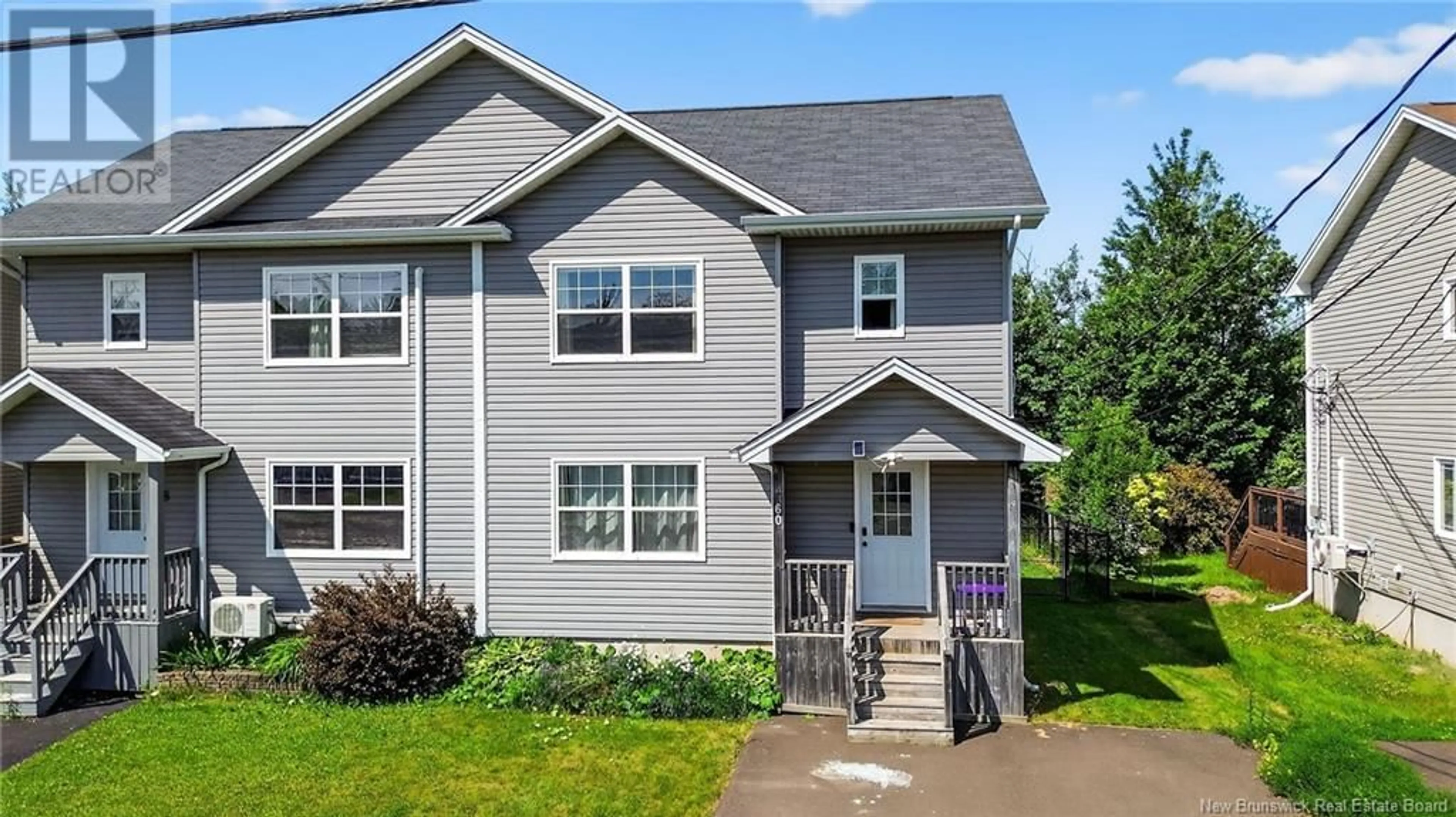 Home with vinyl exterior material, street for 60 WHISPERWOOD DRIVE, Moncton New Brunswick E1G0P8