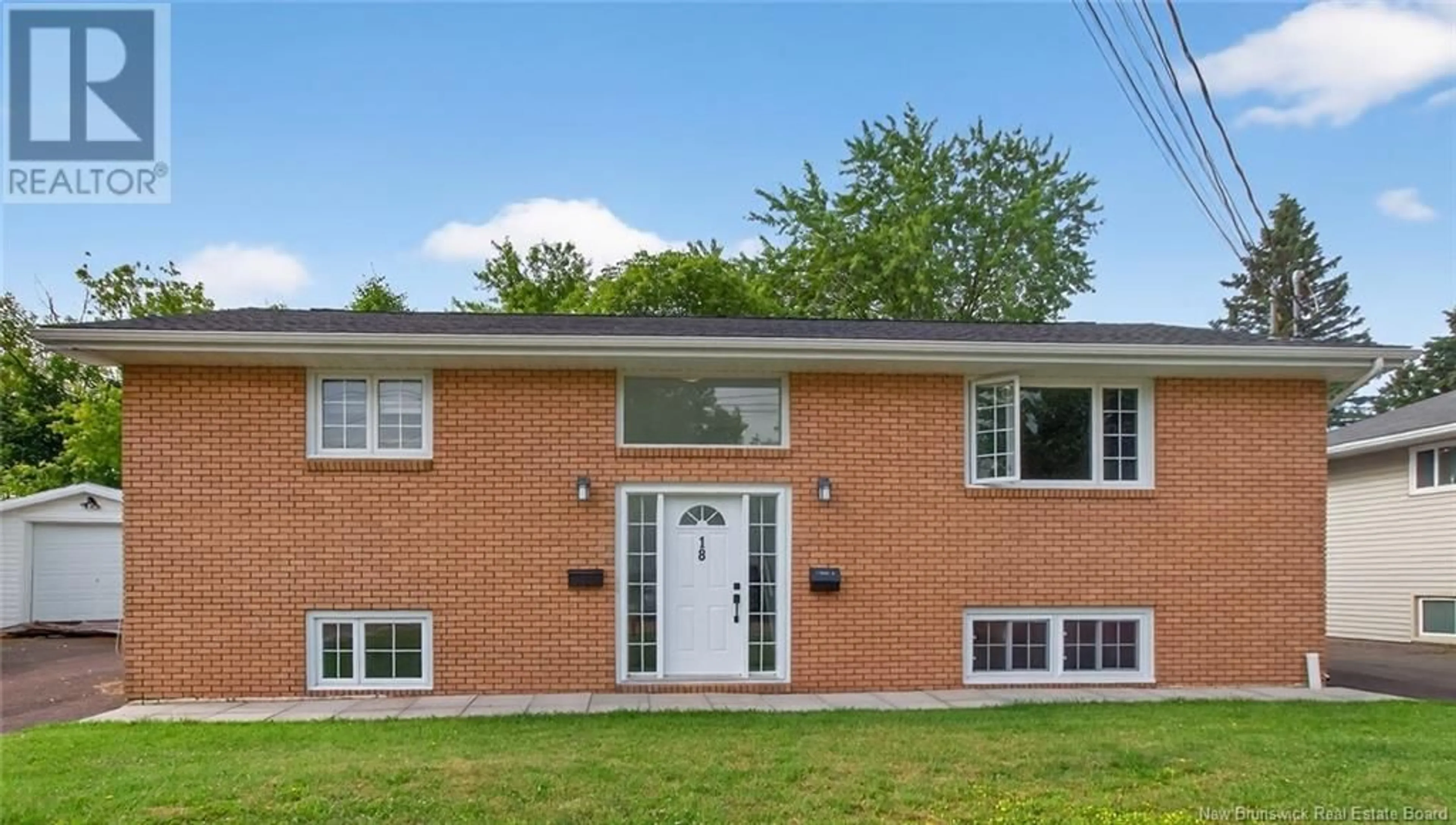 Home with brick exterior material, street for 18 TWEEDSMUIR DRIVE, Moncton New Brunswick E1E1R8