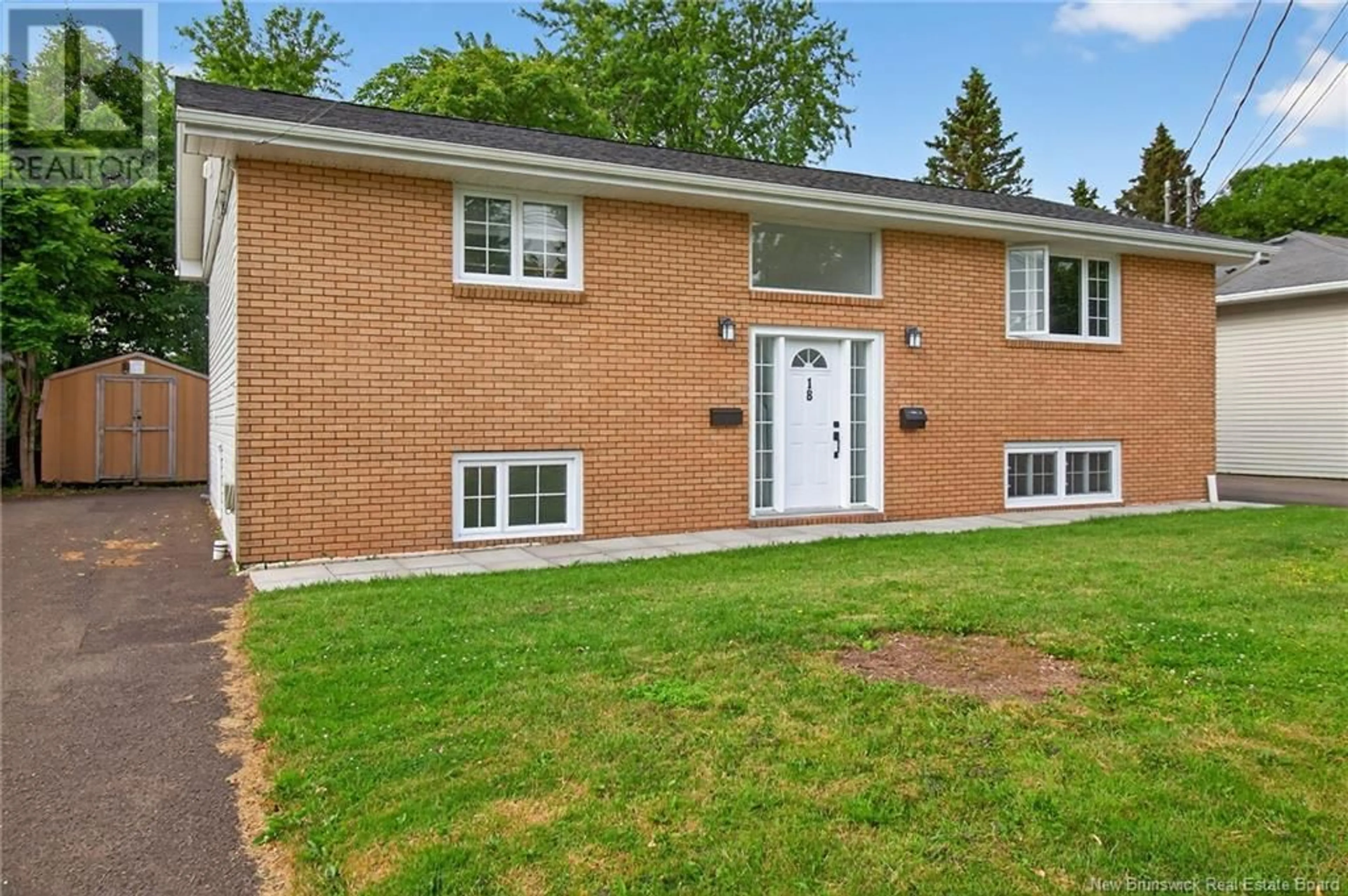 Home with brick exterior material, street for 18 TWEEDSMUIR DRIVE, Moncton New Brunswick E1E1R8