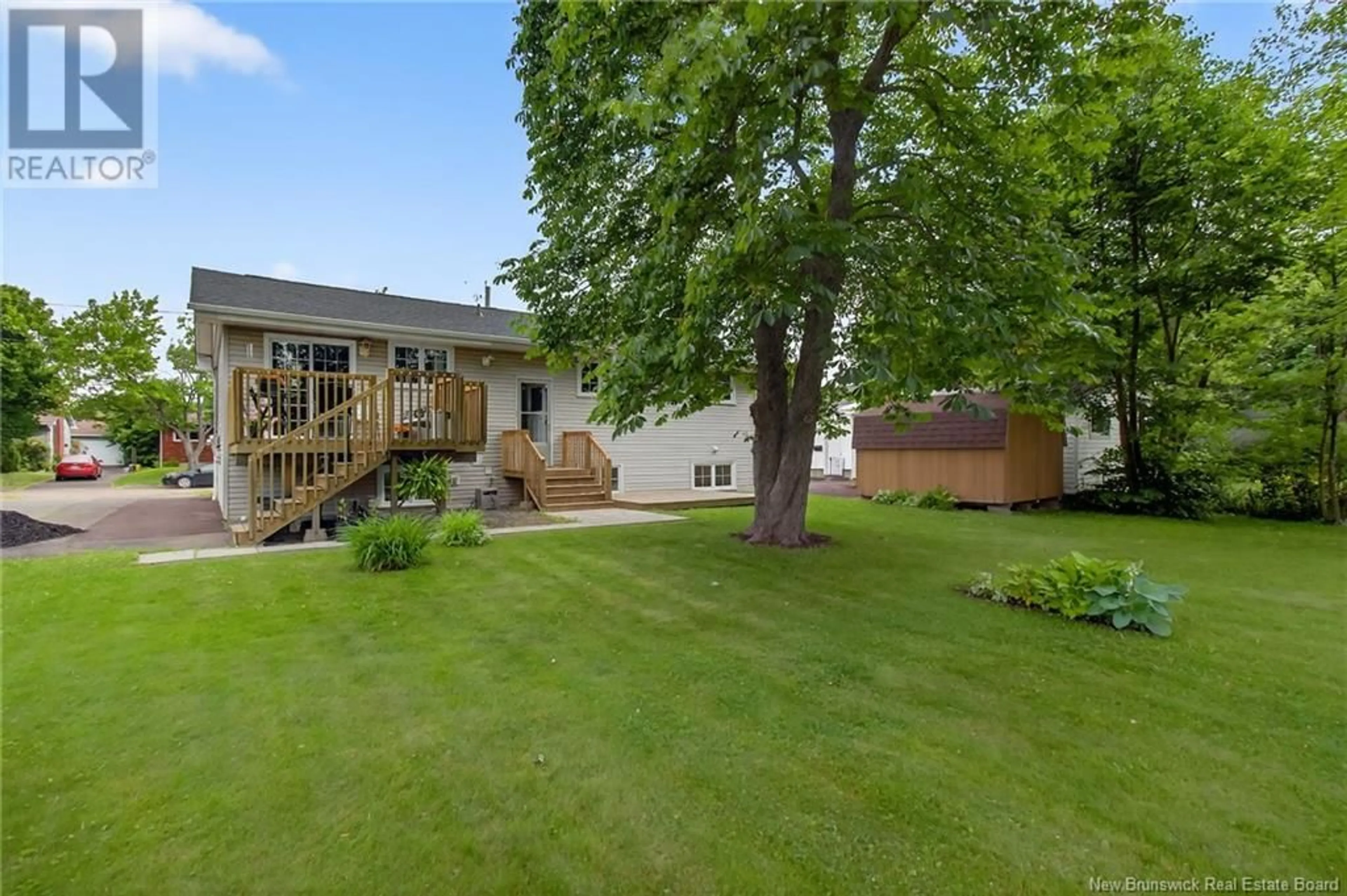 A pic from outside/outdoor area/front of a property/back of a property/a pic from drone, unknown for 18 TWEEDSMUIR DRIVE, Moncton New Brunswick E1E1R8