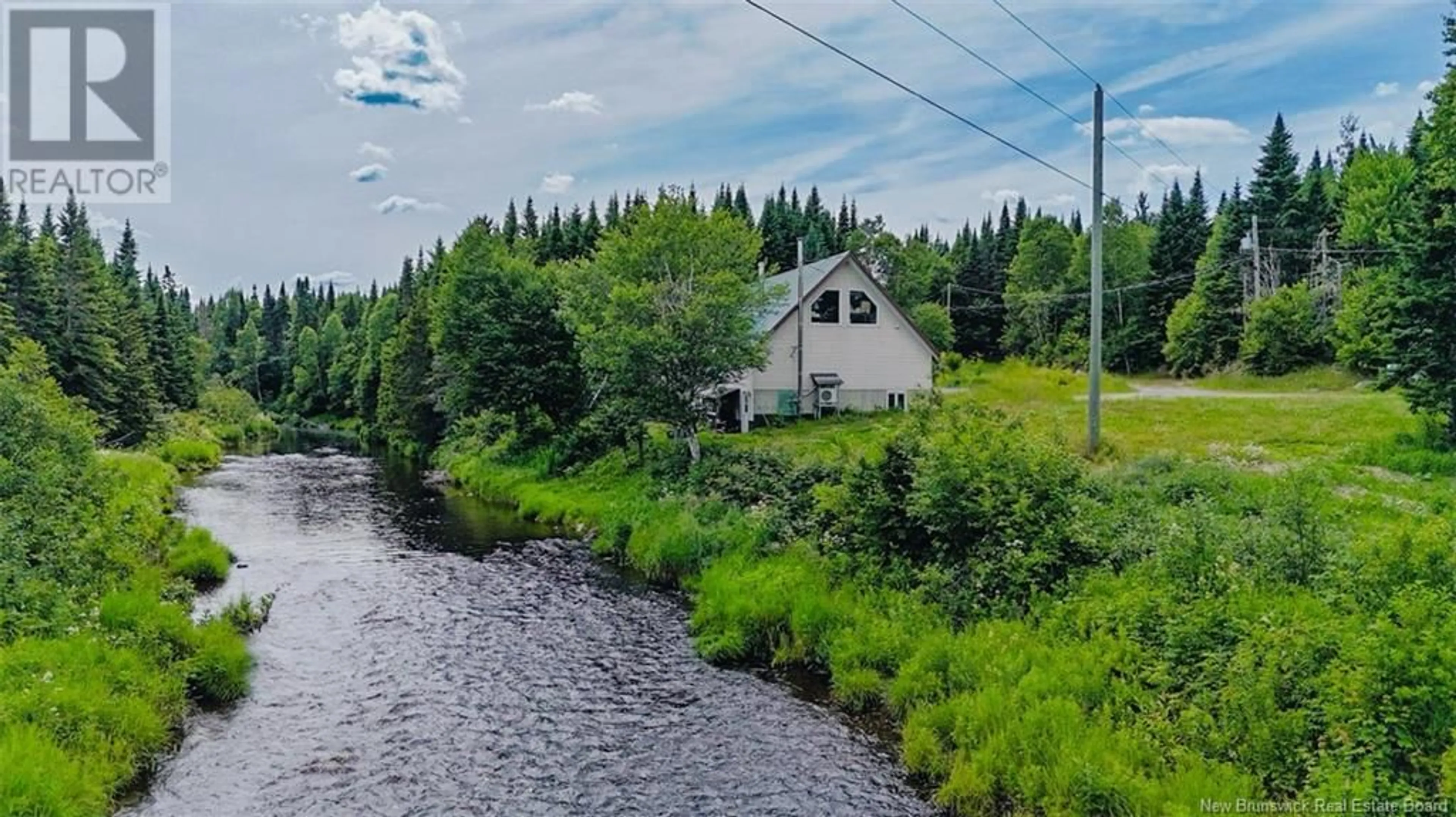 A pic from outside/outdoor area/front of a property/back of a property/a pic from drone, water/lake/river/ocean view for 19 CHIPMUNK LANE, Juniper New Brunswick E7L1J9