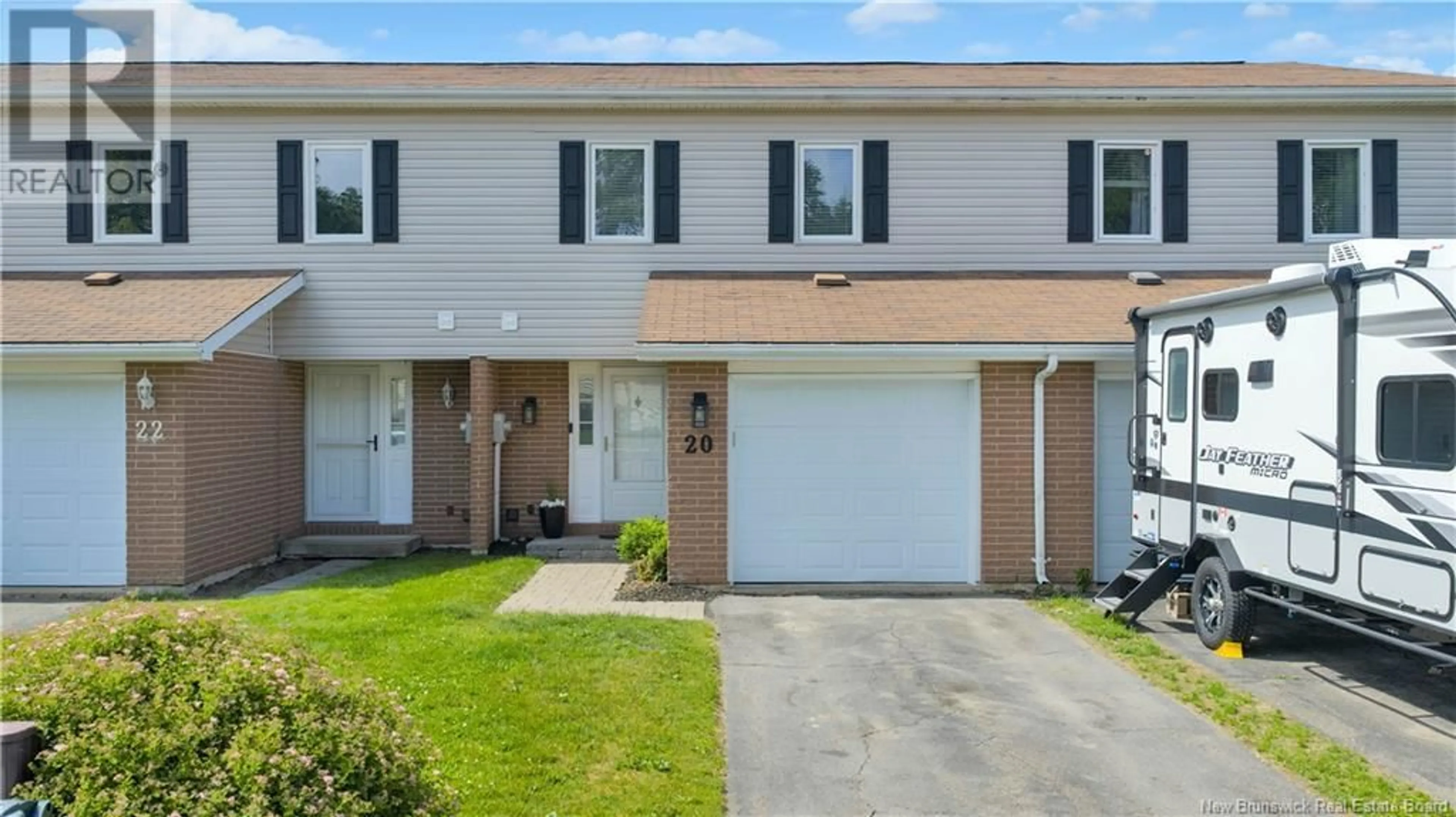 Home with vinyl exterior material, street for 20 DRIFTWOOD LANE, Saint John New Brunswick E2M5L5