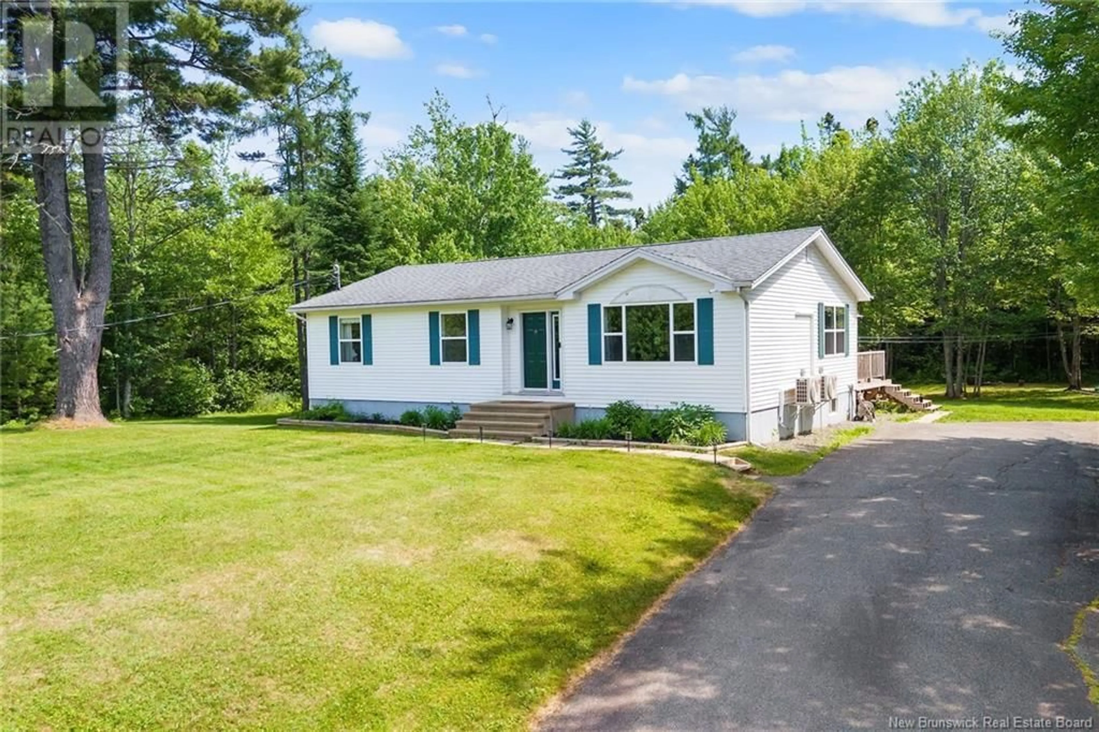 Home with vinyl exterior material, street for 715 WHITTAKER ROAD, Beaver Dam New Brunswick E3B7W7