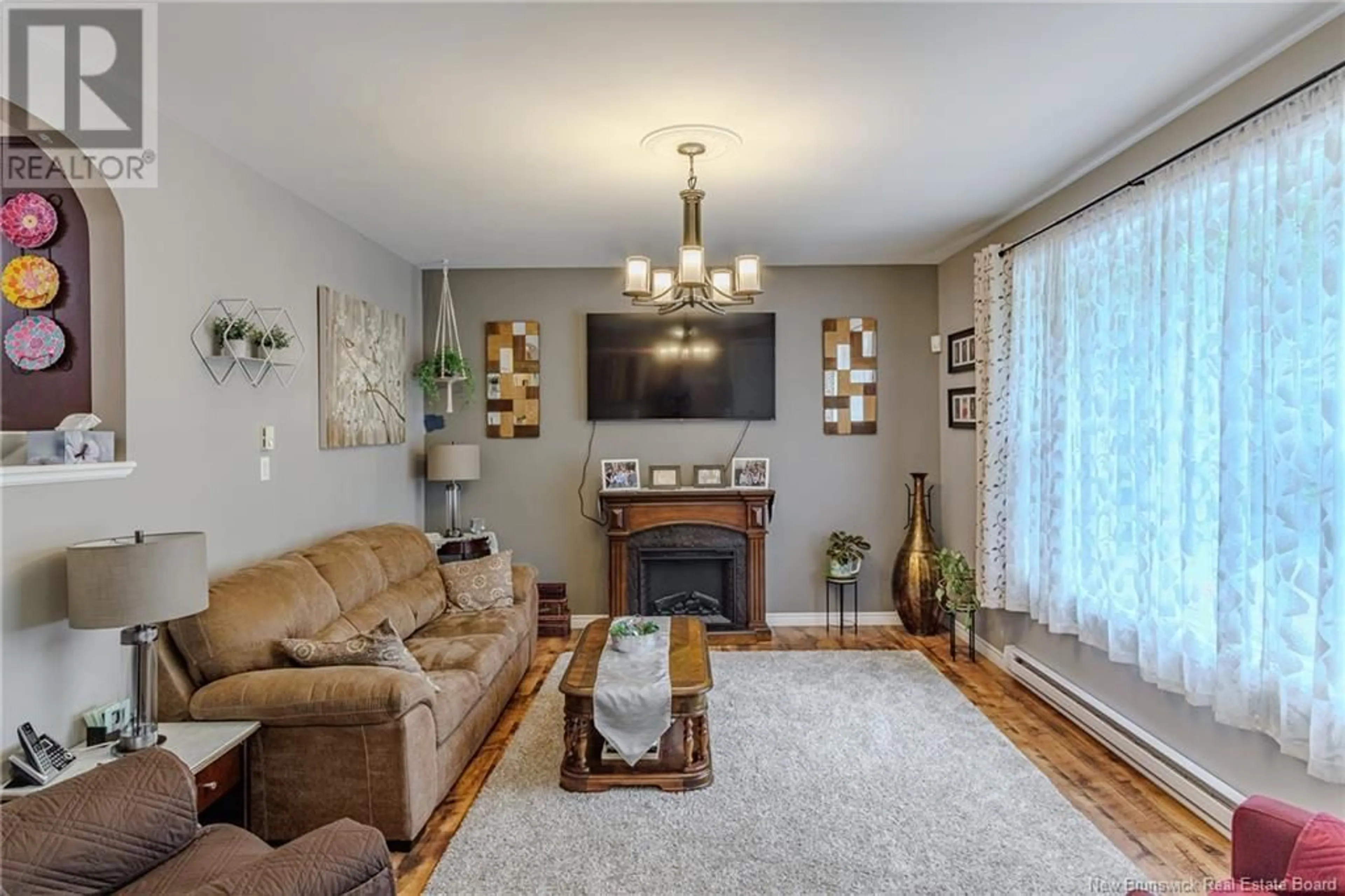 Living room with furniture, wood/laminate floor for 864 CAMPBELL ROAD, Nerepis New Brunswick E5K3W2