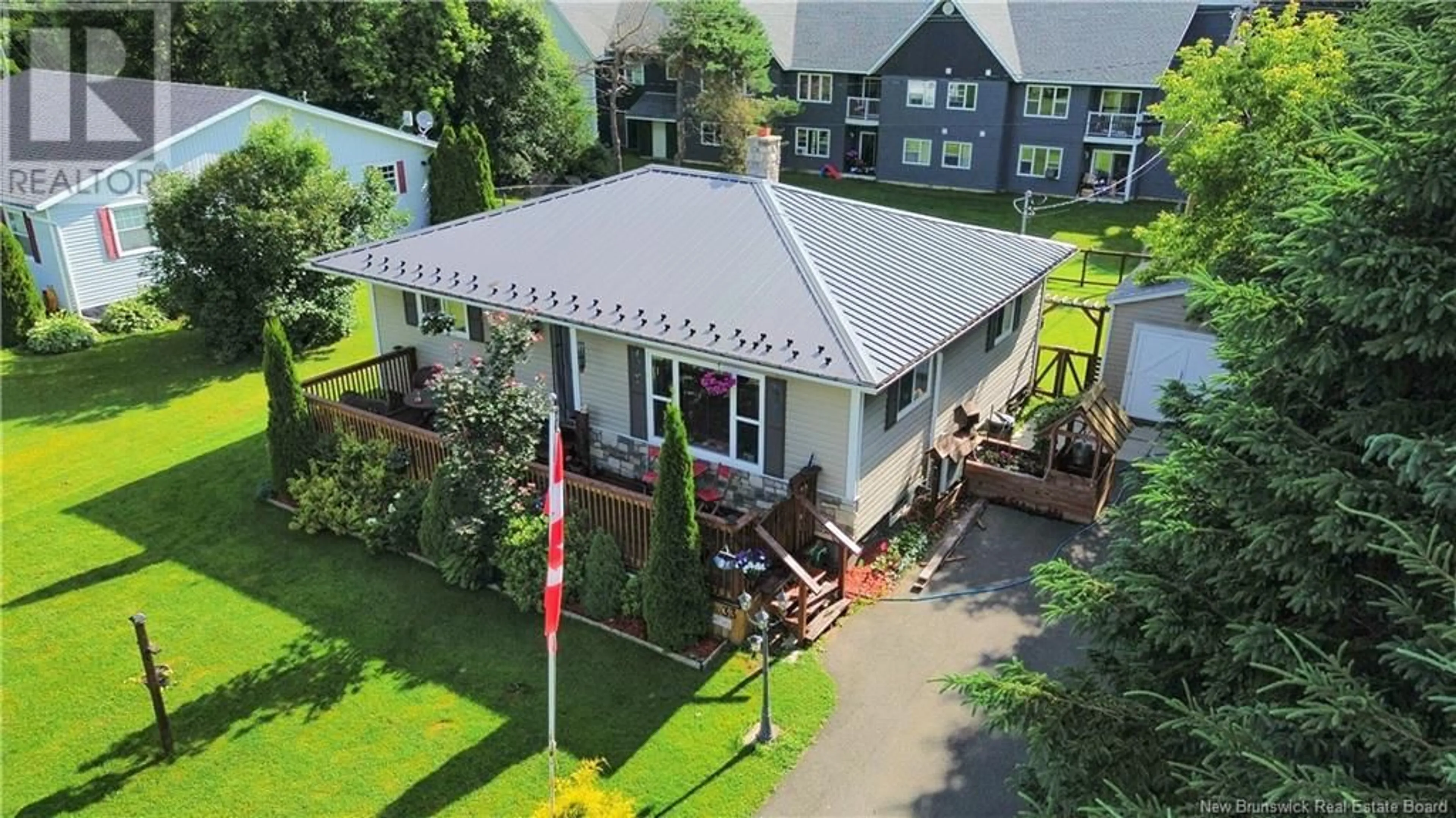 A pic from outside/outdoor area/front of a property/back of a property/a pic from drone, street for 33 CENTENNIAL CRESCENT, Florenceville-Bristol New Brunswick E7L1Z4