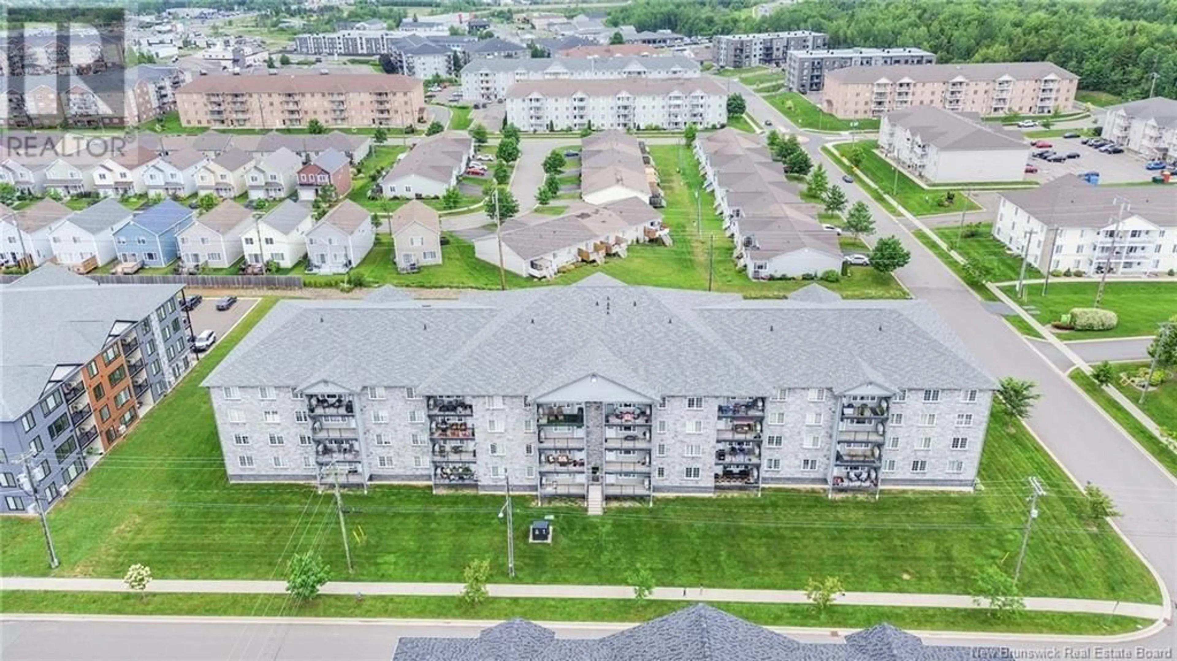 A pic from outside/outdoor area/front of a property/back of a property/a pic from drone, unknown for 323 - 155 LIAN STREET, Fredericton New Brunswick E3C0L9