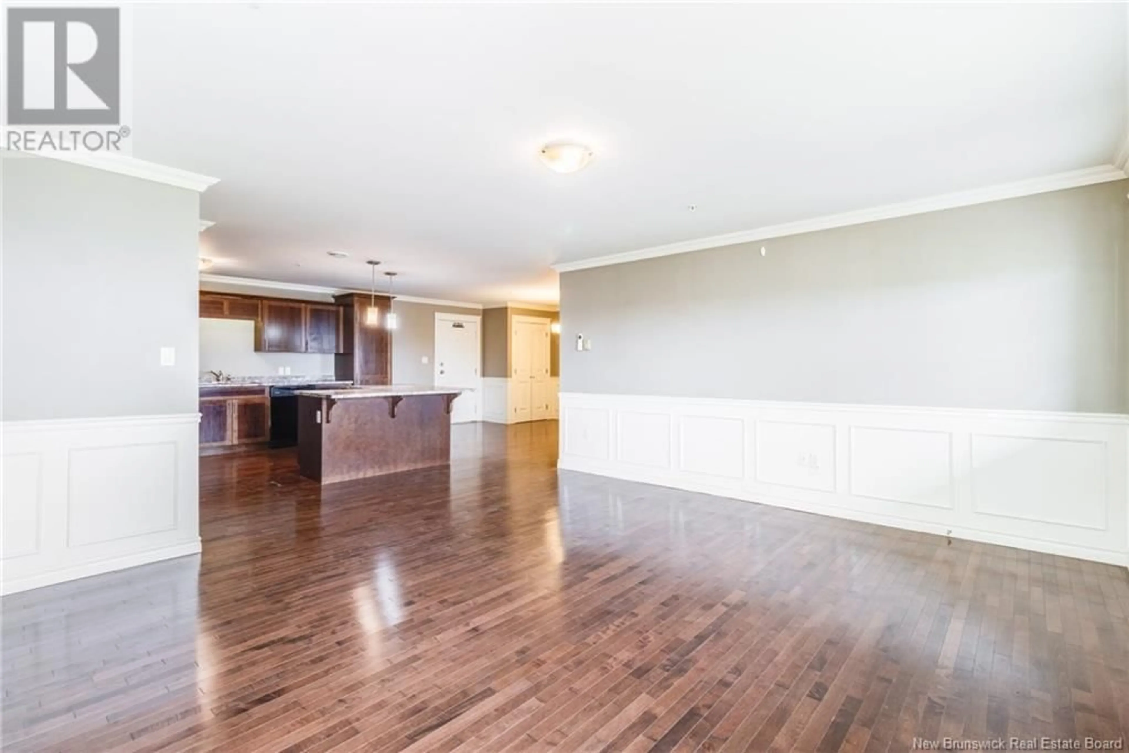 Open concept kitchen, wood/laminate floor for 323 - 155 LIAN STREET, Fredericton New Brunswick E3C0L9