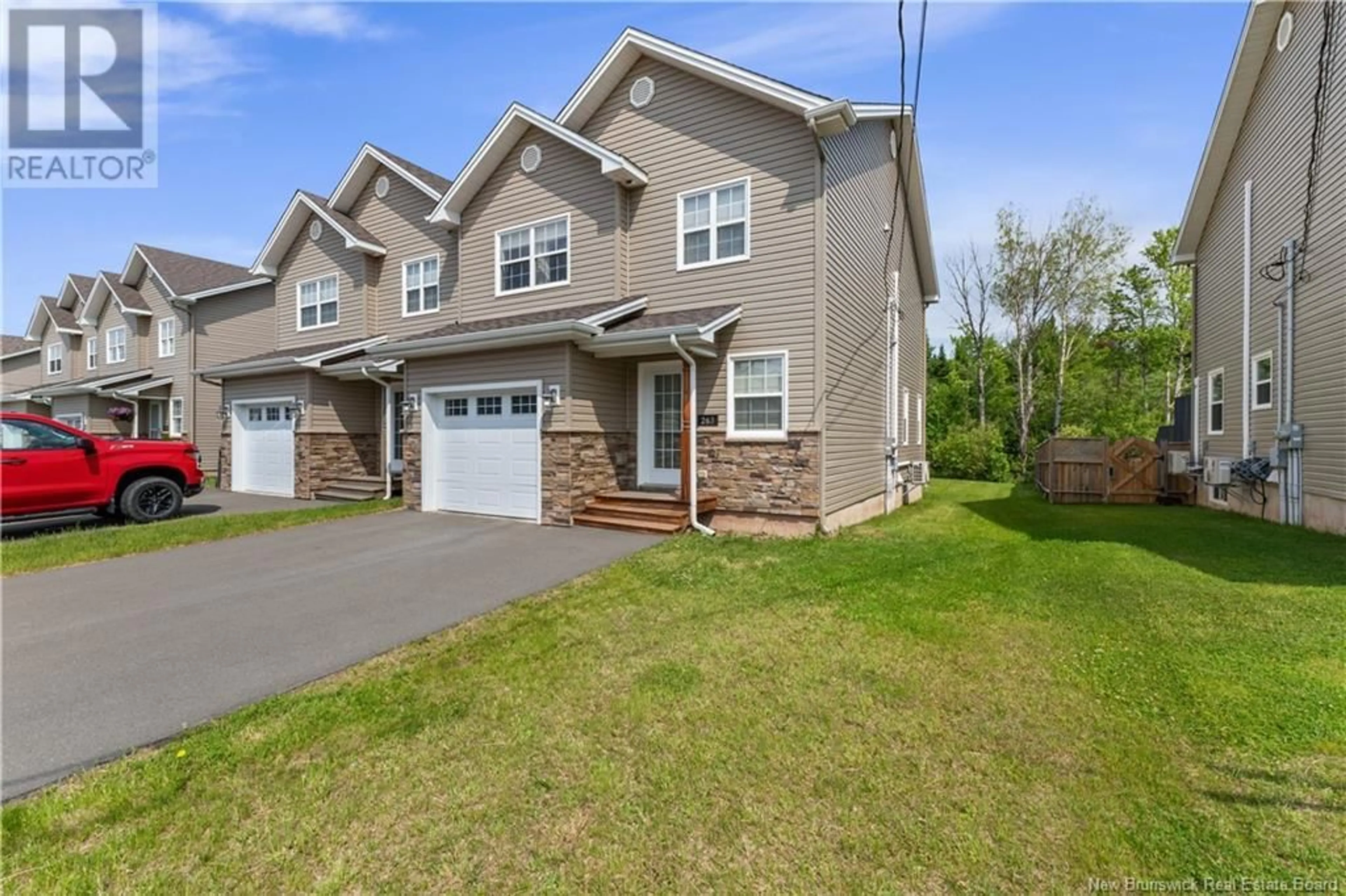 Home with vinyl exterior material, street for 263 DOLBEAU, Dieppe New Brunswick E1A9P9