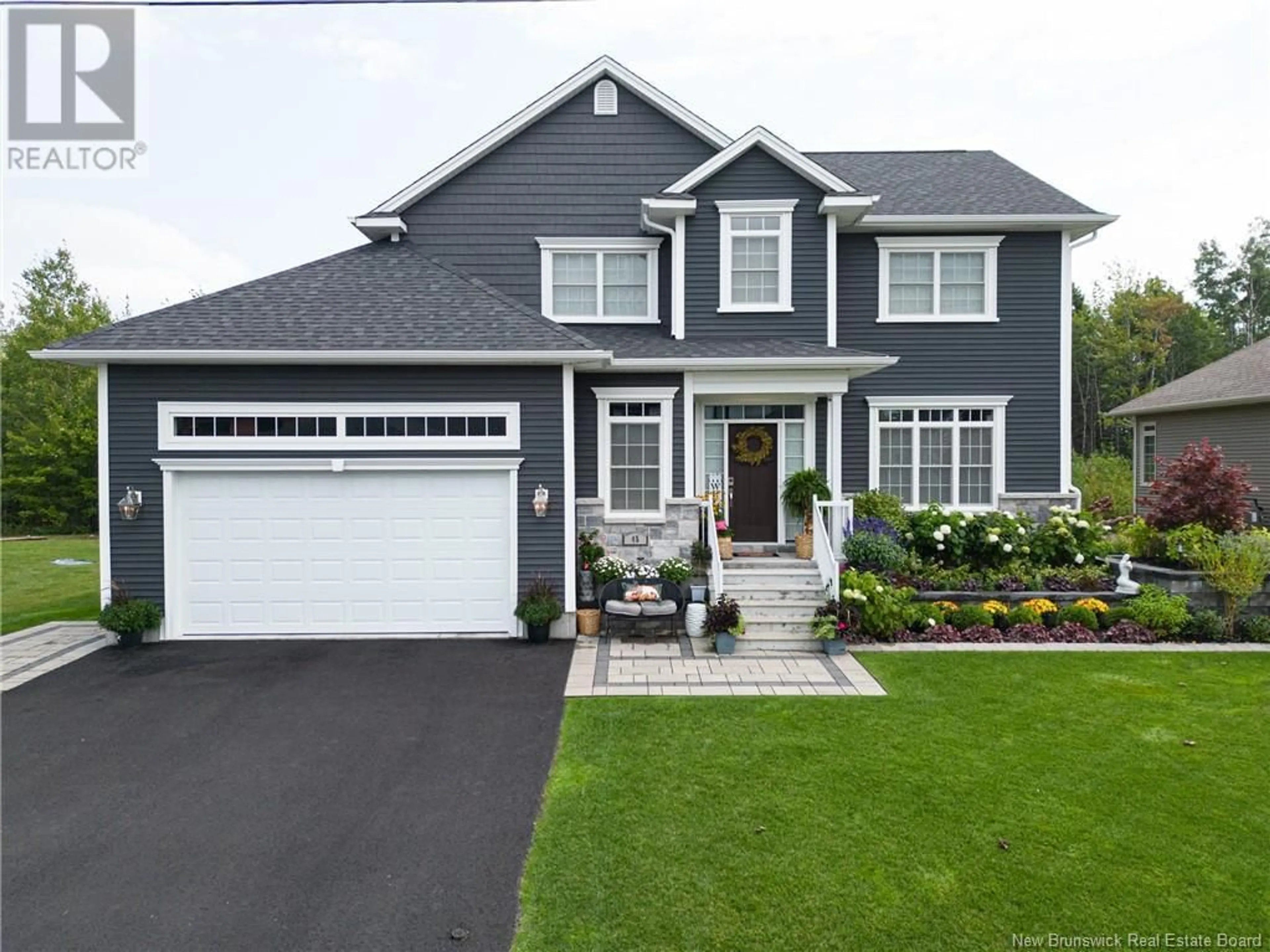 Home with vinyl exterior material, street for 45 BARCROFT DRIVE, Fredericton New Brunswick E3B0Y7