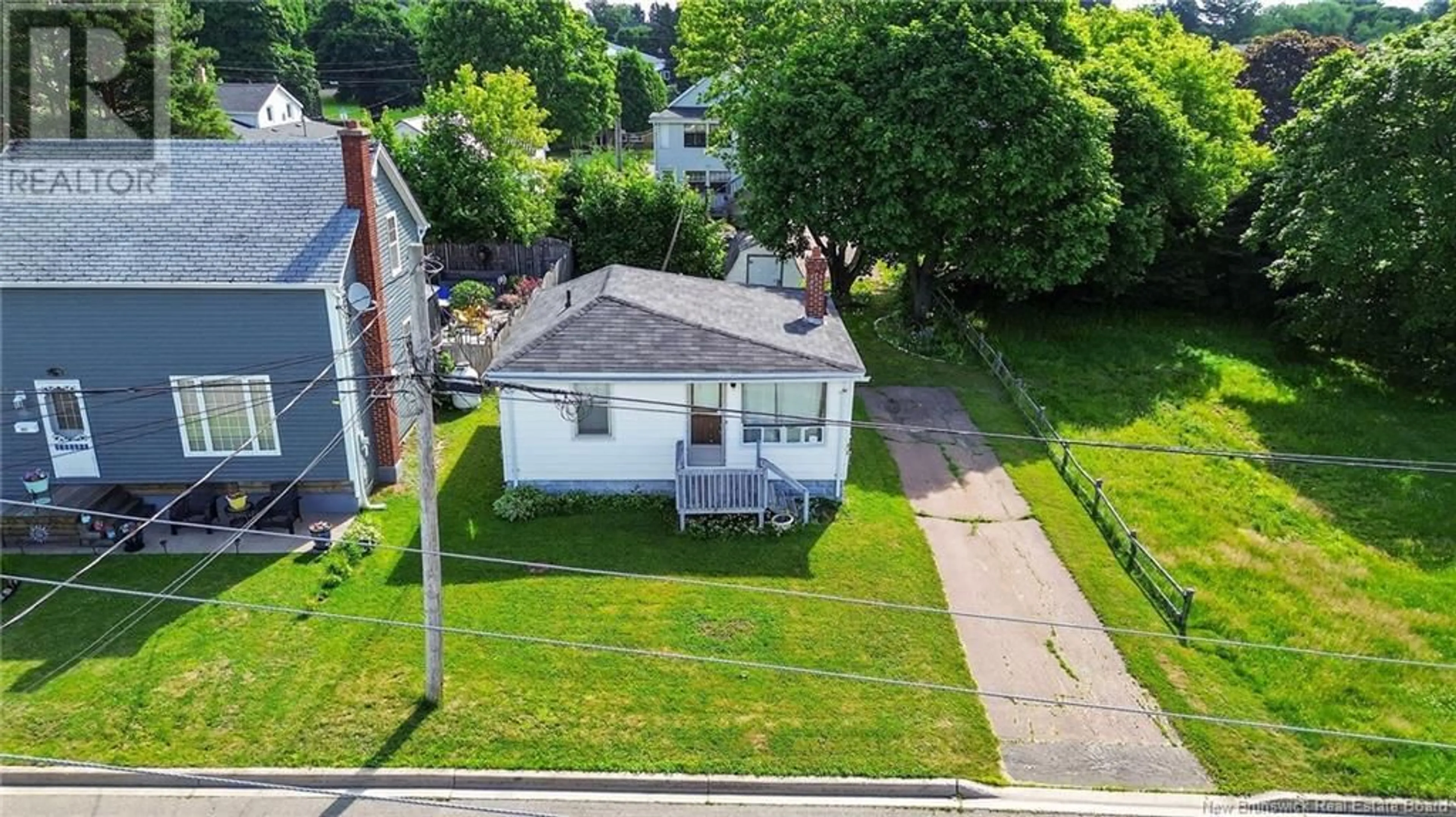 A pic from outside/outdoor area/front of a property/back of a property/a pic from drone, street for 653 CHARLES STREET, Dieppe New Brunswick E1A1Z5