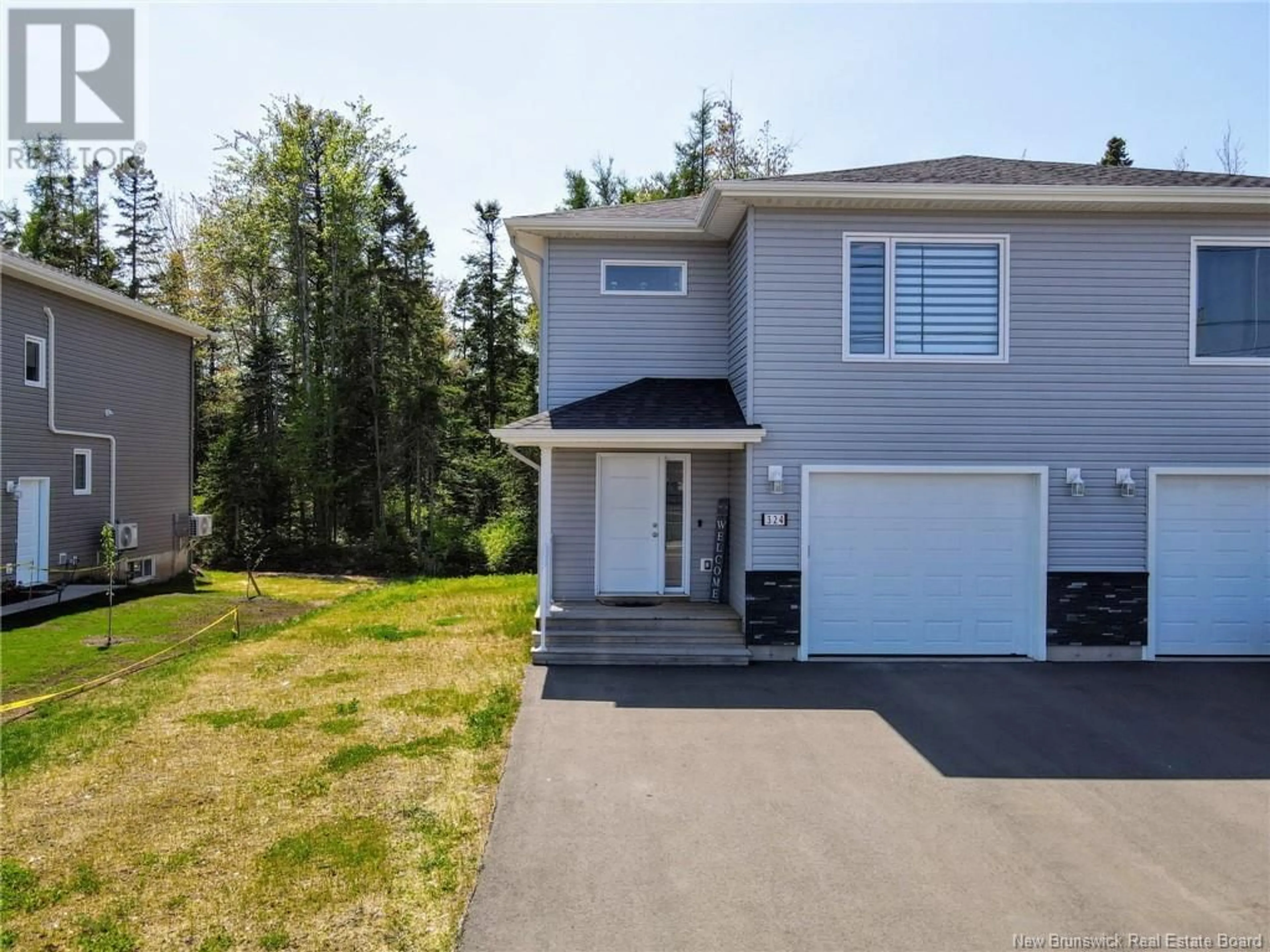 Home with vinyl exterior material, street for 324 TEABERRY AVENUE, Moncton New Brunswick E1G6E6