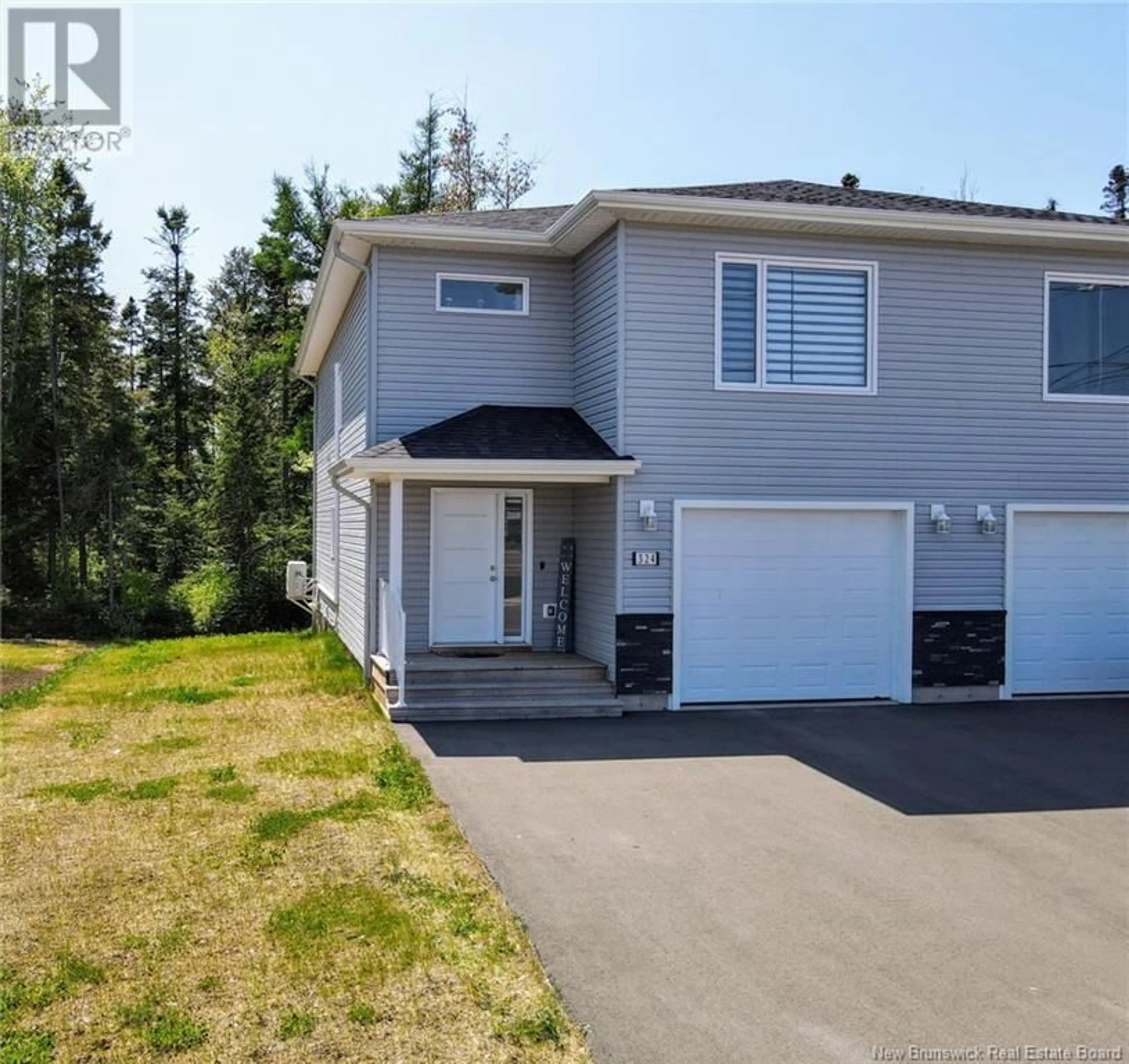 A pic from outside/outdoor area/front of a property/back of a property/a pic from drone, street for 324 TEABERRY AVENUE, Moncton New Brunswick E1G6E6