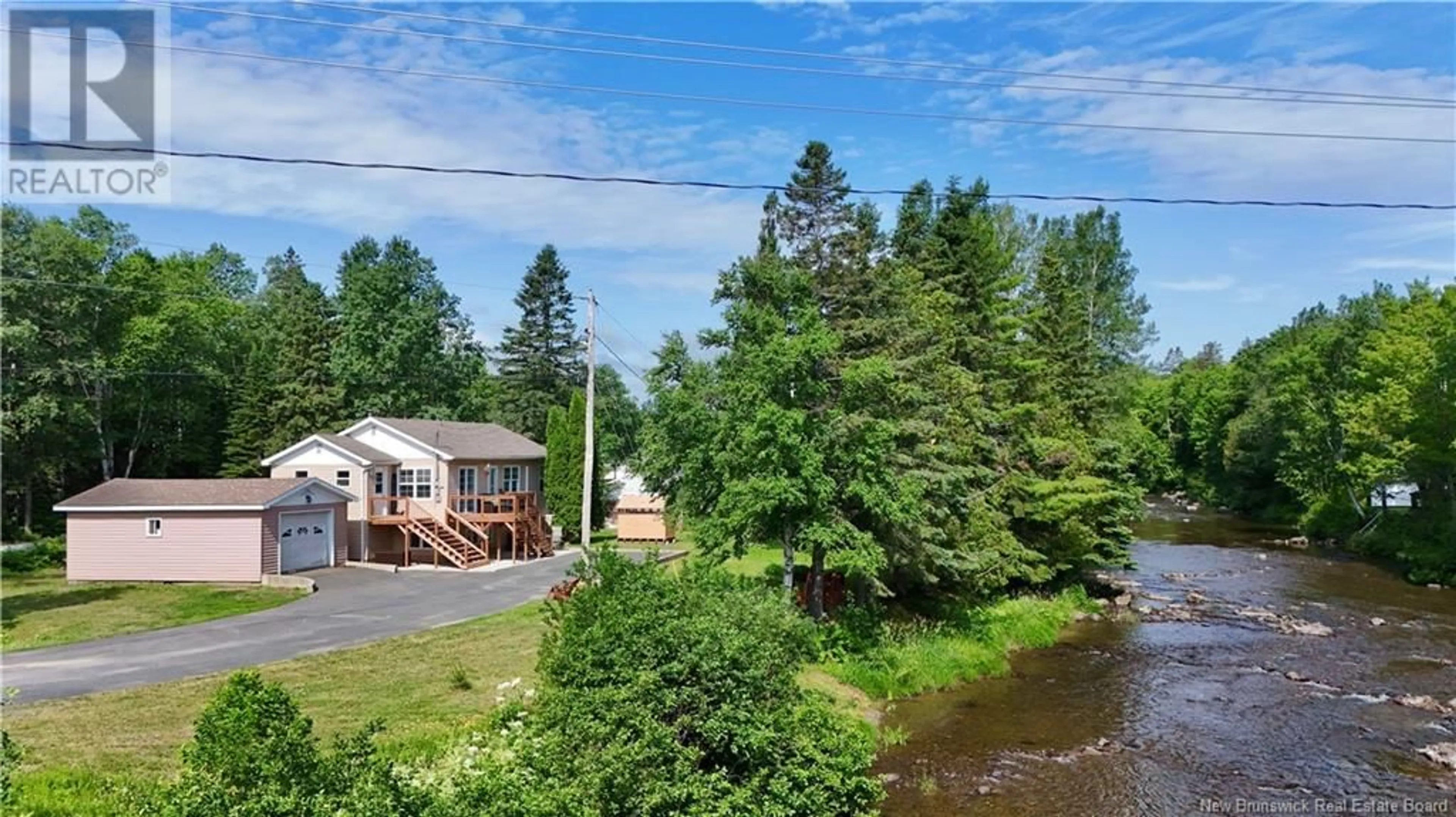 A pic from outside/outdoor area/front of a property/back of a property/a pic from drone, water/lake/river/ocean view for 2028 MILLSTREAM, Dunlop New Brunswick E8K2K3
