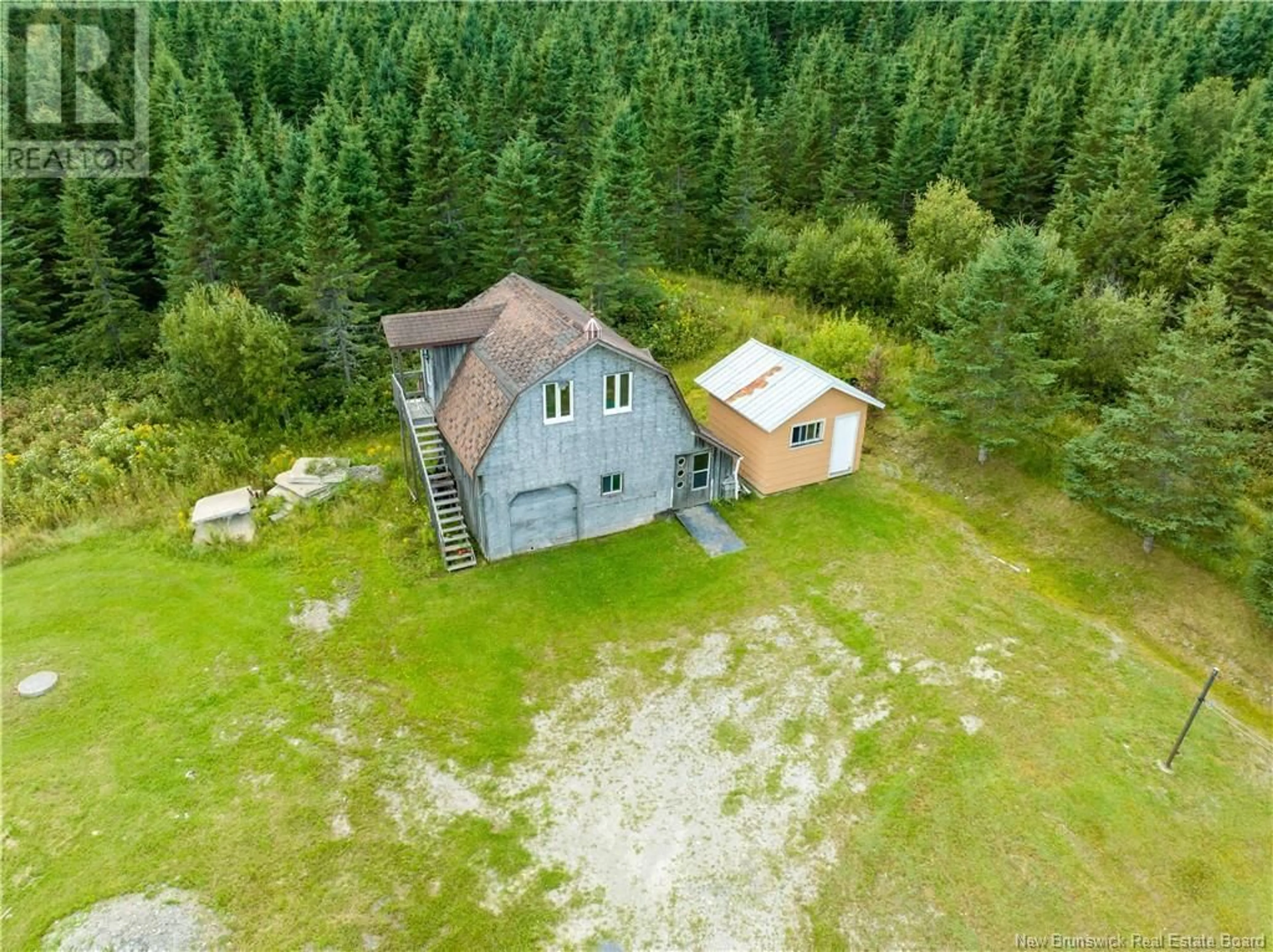 A pic from outside/outdoor area/front of a property/back of a property/a pic from drone, forest/trees view for 474 TOUSSAINT ROAD, Saint-Joseph New Brunswick E7B2T8