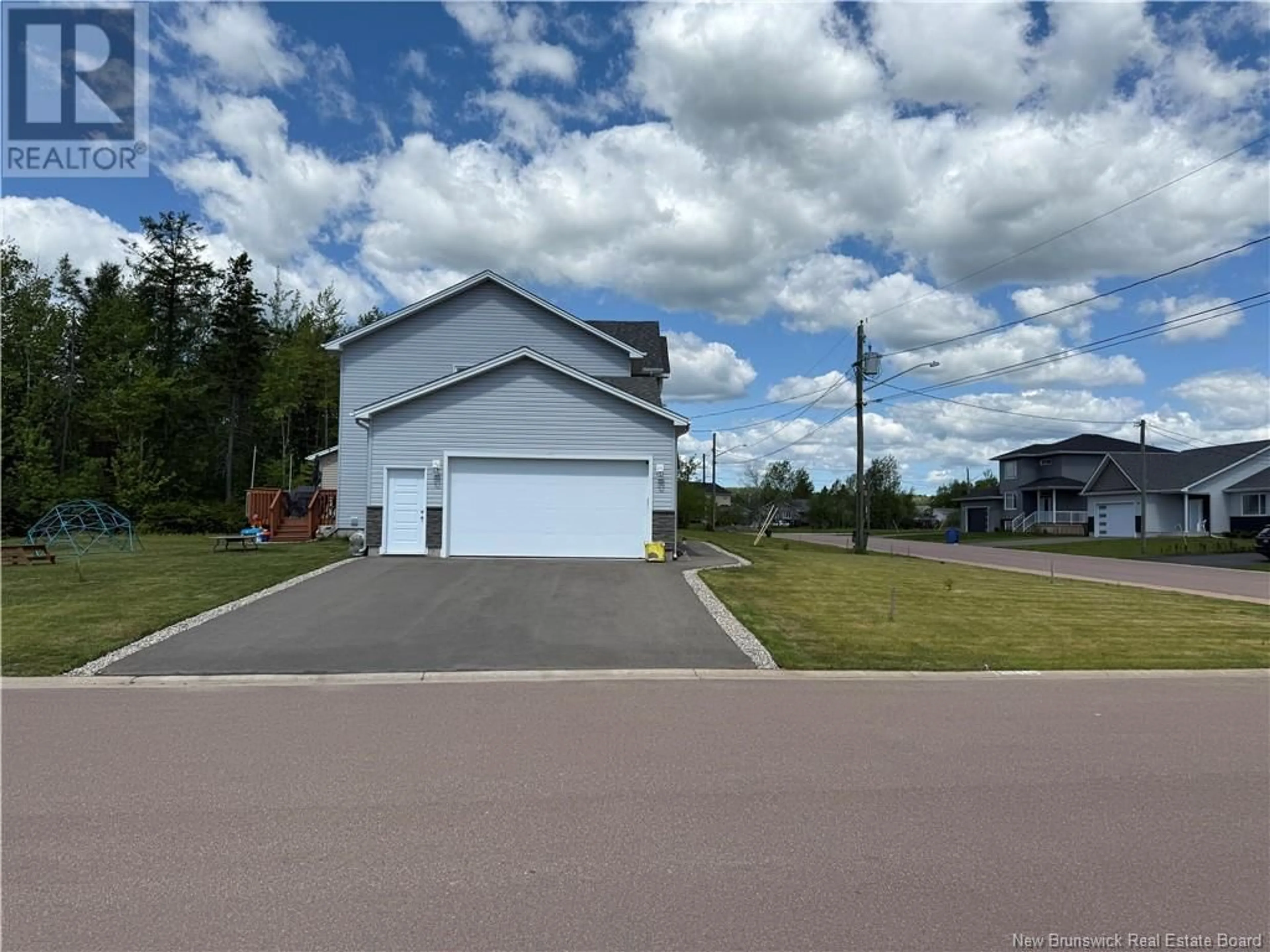 A pic from outside/outdoor area/front of a property/back of a property/a pic from drone, street for 92 SATARA DRIVE, Moncton New Brunswick E1G6G3