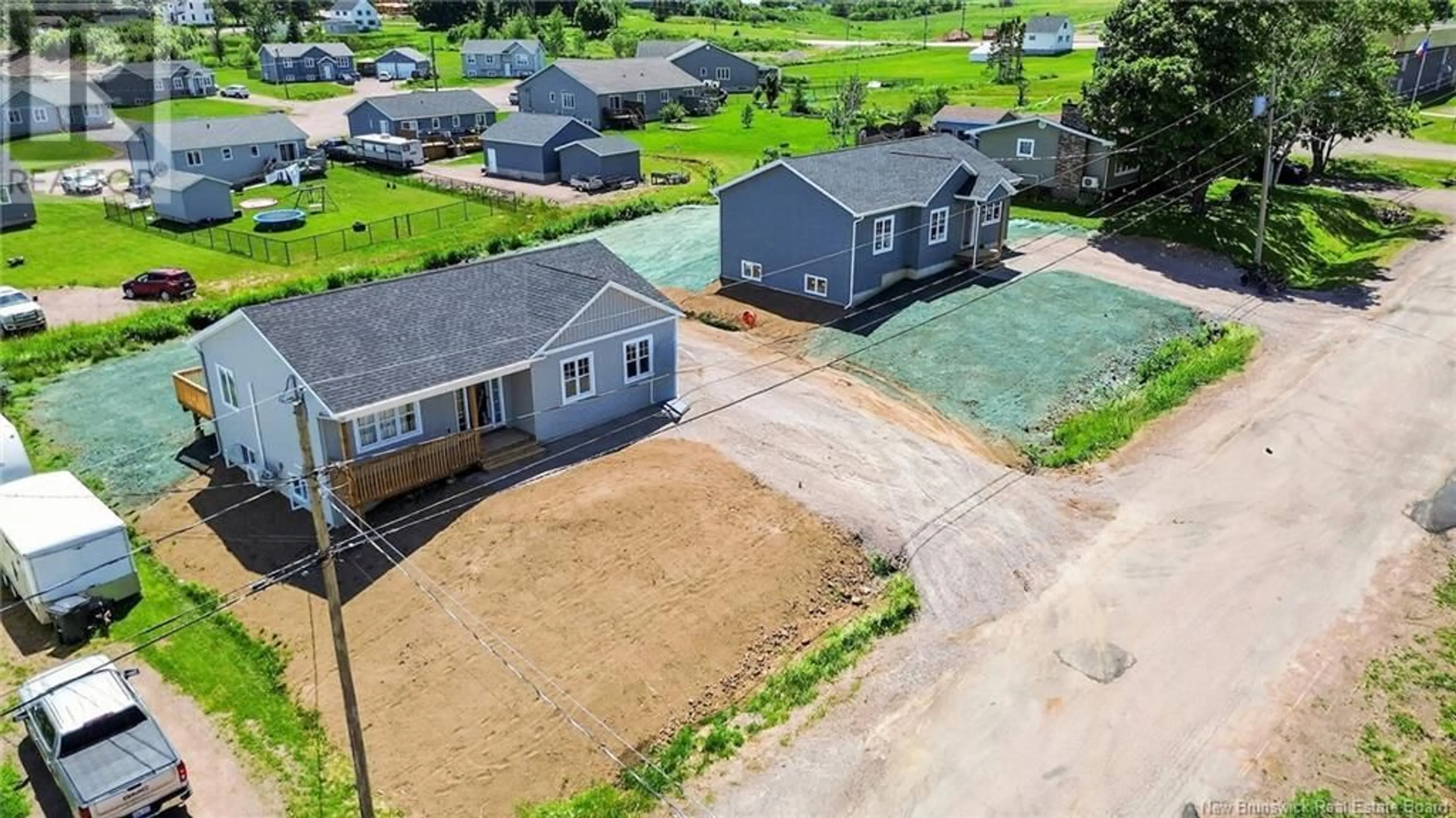 A pic from outside/outdoor area/front of a property/back of a property/a pic from drone, street for 137 DUCHARME STREET, Memramcook New Brunswick E4K2G2